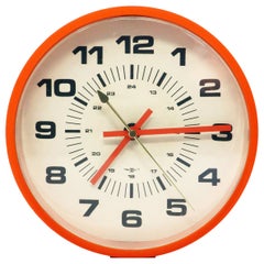 Vintage Orange Wall Clock by Howard Miller