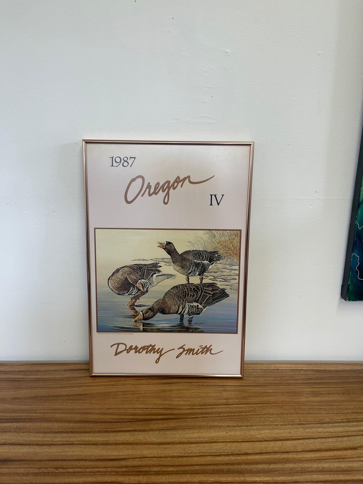 Framed print of Ducks in water. Signature and detailing at the top of the print. Within a copper toned frame. Vintage Condition Consistent with Age as Pictured.

Dimensions. 16 W ; 1/2 D ; 24 H