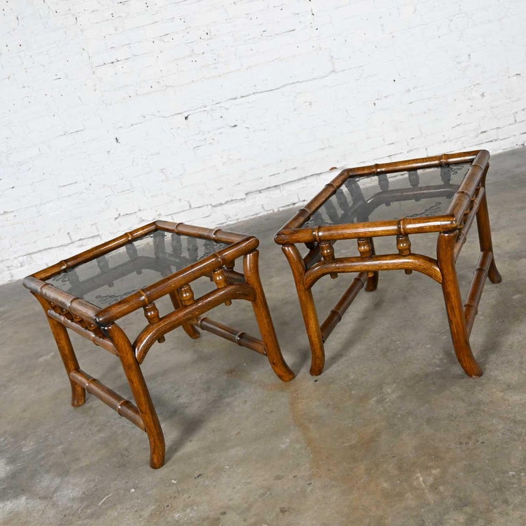 Awesome pair of vintage organic modern and a bit Boho Chic or Hollywood Regency faux rattan rectangle end tables with lightly smoked glass tops featuring etched corners. Beautiful condition, keeping in mind that these are vintage and not new so will