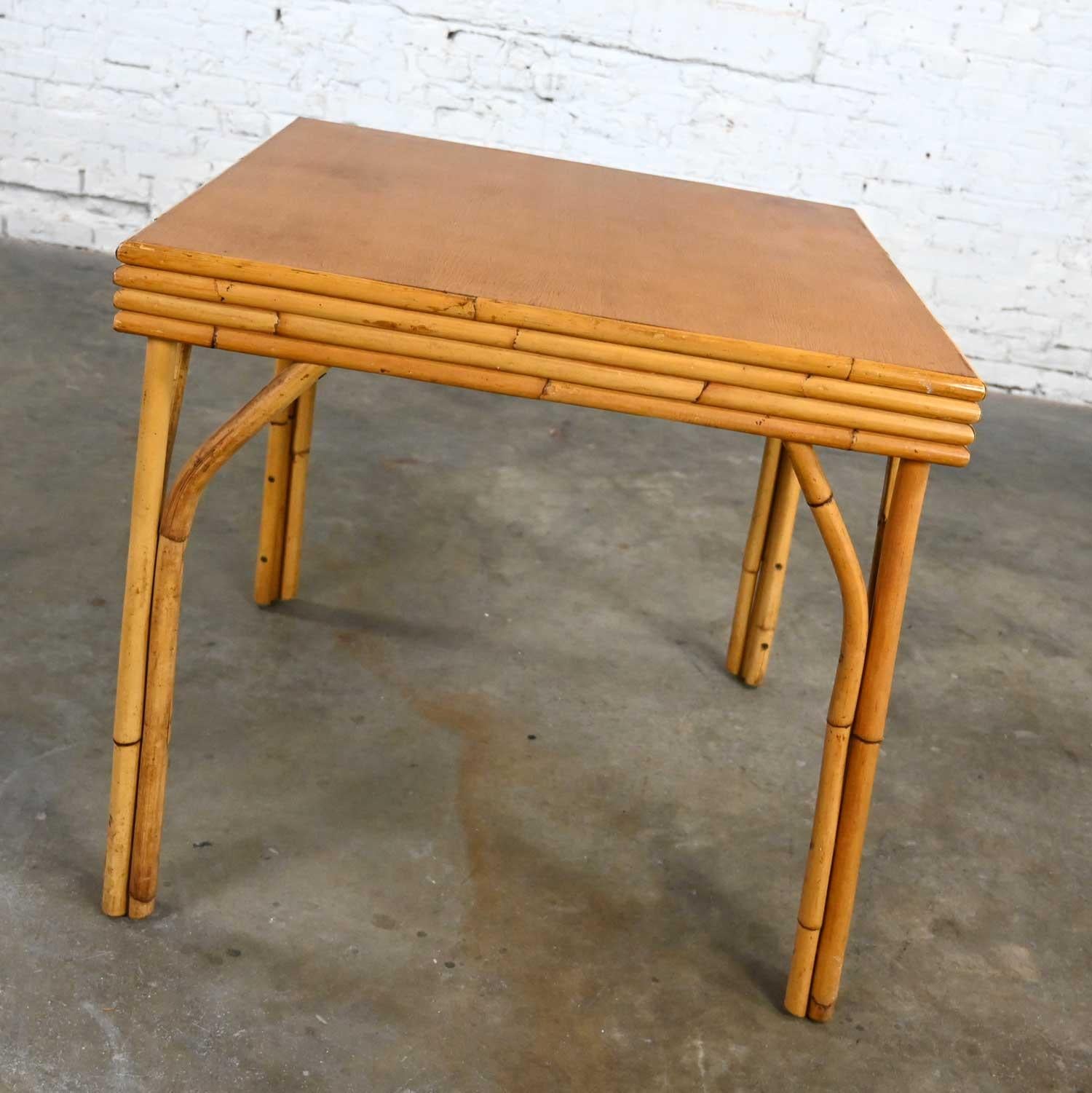 Lovely vintage organic modern Island style square rattan dining table with a mahogany top. Beautiful condition, keeping in mind that this is vintage and not new so will have signs of use and wear. The top has dark ring which we are choosing to let