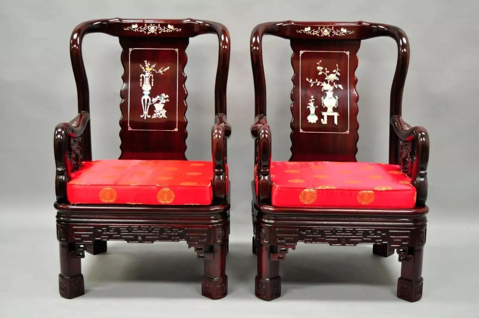 Vintage Oriental Chinese Carved Wood Throne Lounge Chairs w/ Pearl Inlay - a Pair. Item features heavy solid wood construction, nicely carved details, Mother of Pearl inlay to back and armrests, removable silk upholstered red seat cushions, fine
