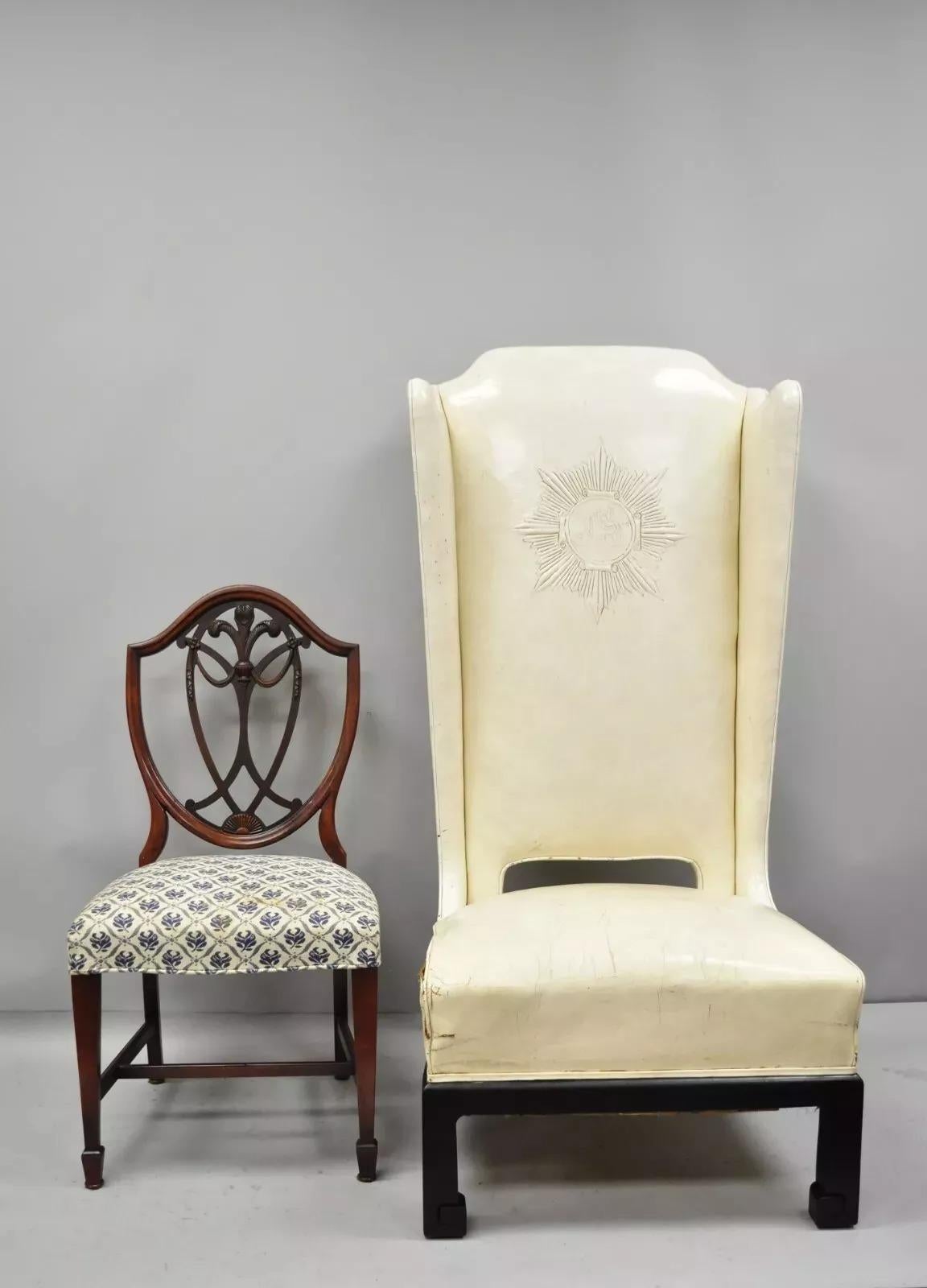 Vintage Oriental High Back Ming Style Black Lacquer Leather Lounge Chair. Item features white leather upholstery, tall over-sized form, carved Ming style legs, sleek sculptural form, great quality and solid construction. Circa Mid 20th Century.