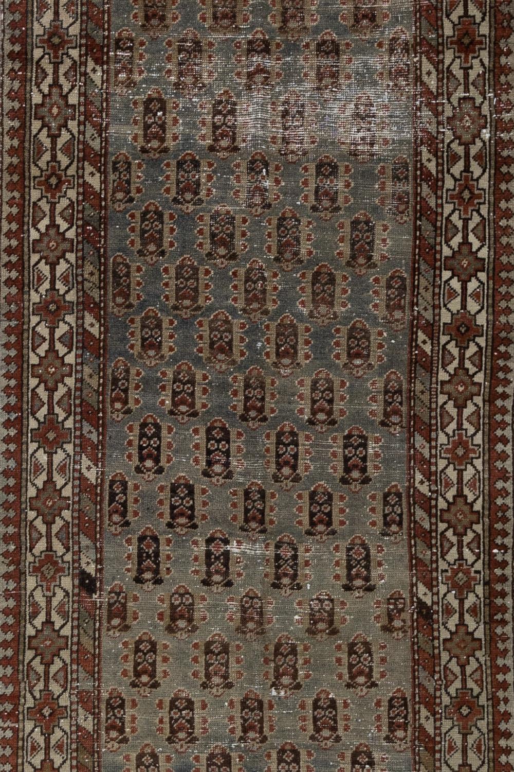 Age: 1930

Pile: Low

Wear Notes: 

Material: Wool on Cotton

Geometric vintage Persian Shashevan runner with a nicely saturated color palette. Safe for high traffic.

Vintage rugs are made by hand over the course of months, sometimes