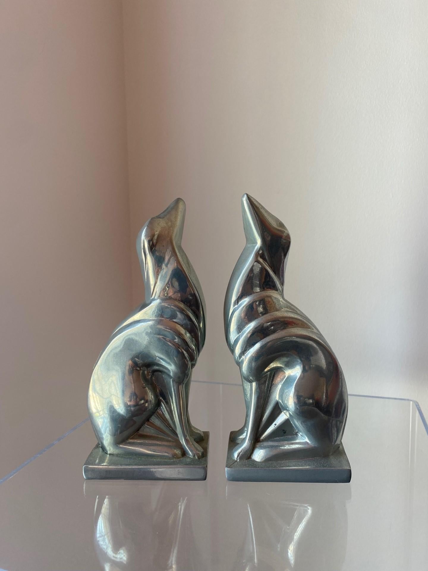 Beautiful and original set of bookends from Frankart. This set is genuine from the early days of this Brooklyn manufacturer.  This art deco representation Russian greyhounds brings to life the stylized realization in art deco.  Art Deco combined
