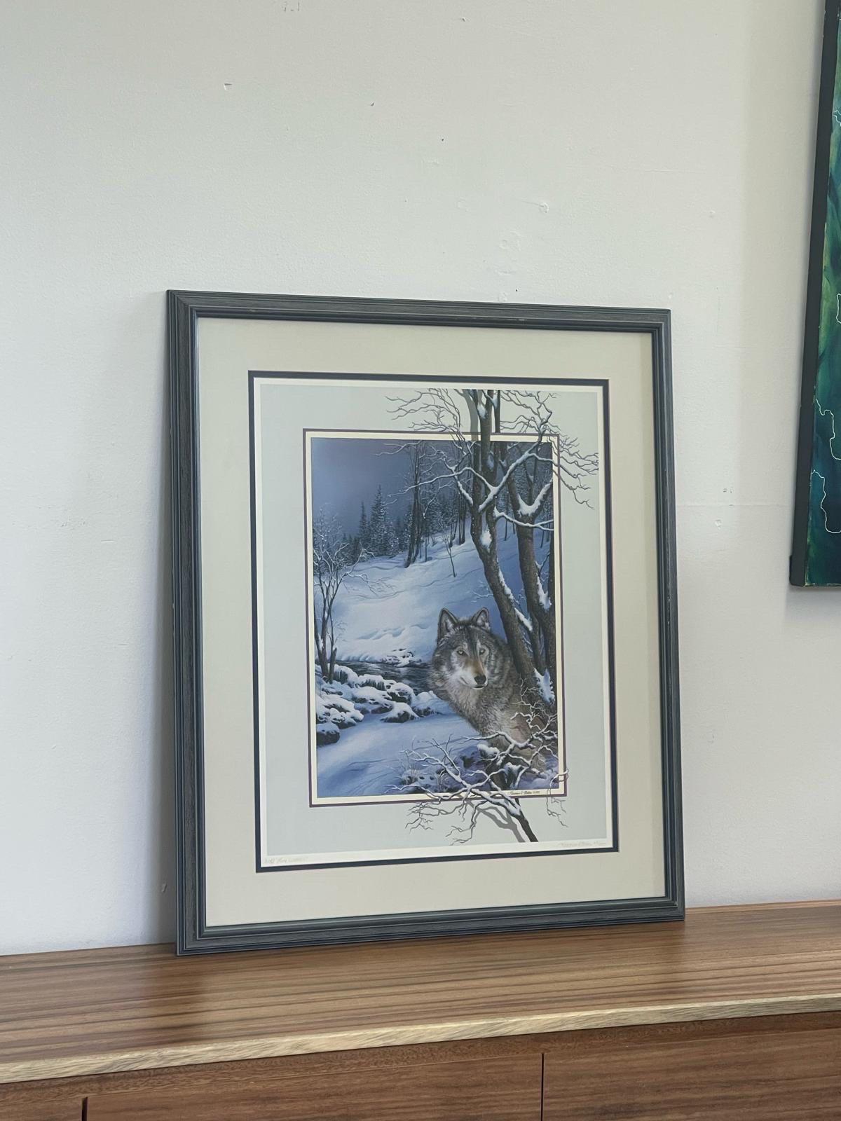 Professionally Framed and Matted Artwork of a Wolf in the Woods. Signed and Numbered and Titled at the Bottom of the Art. Blue Toned Painting Complimented by the Blue Painted Wood Framing. Vintage Condition Consistent with Age as