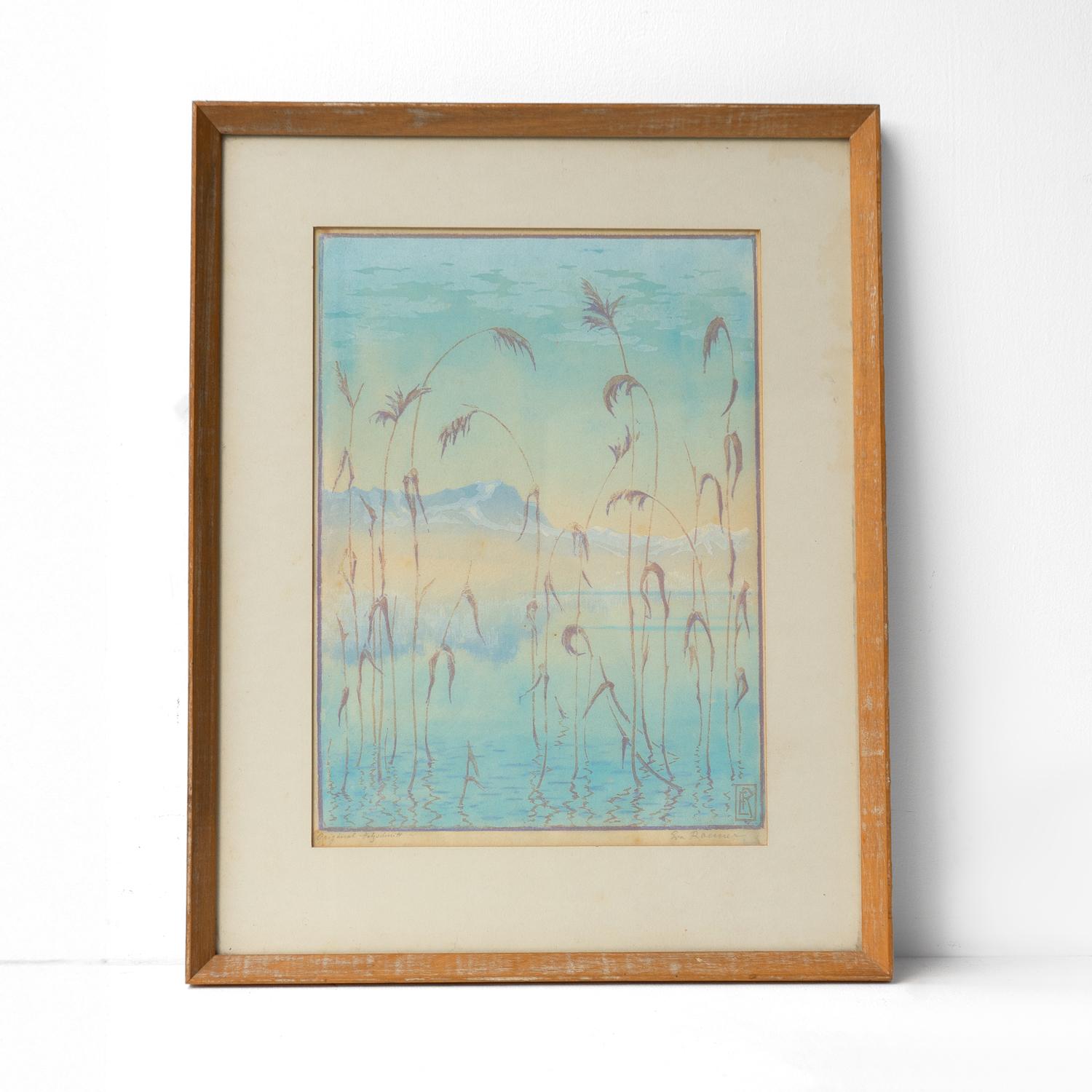 VINTAGE FRAMED WOODCUT PRINT BY EVA ROEMER (1889-1977)
Depicting a dreamy landscape scene looking through the foliage in the foreground over a lake to mountains in the background using a typically pale blue pastel colour palette and expertly