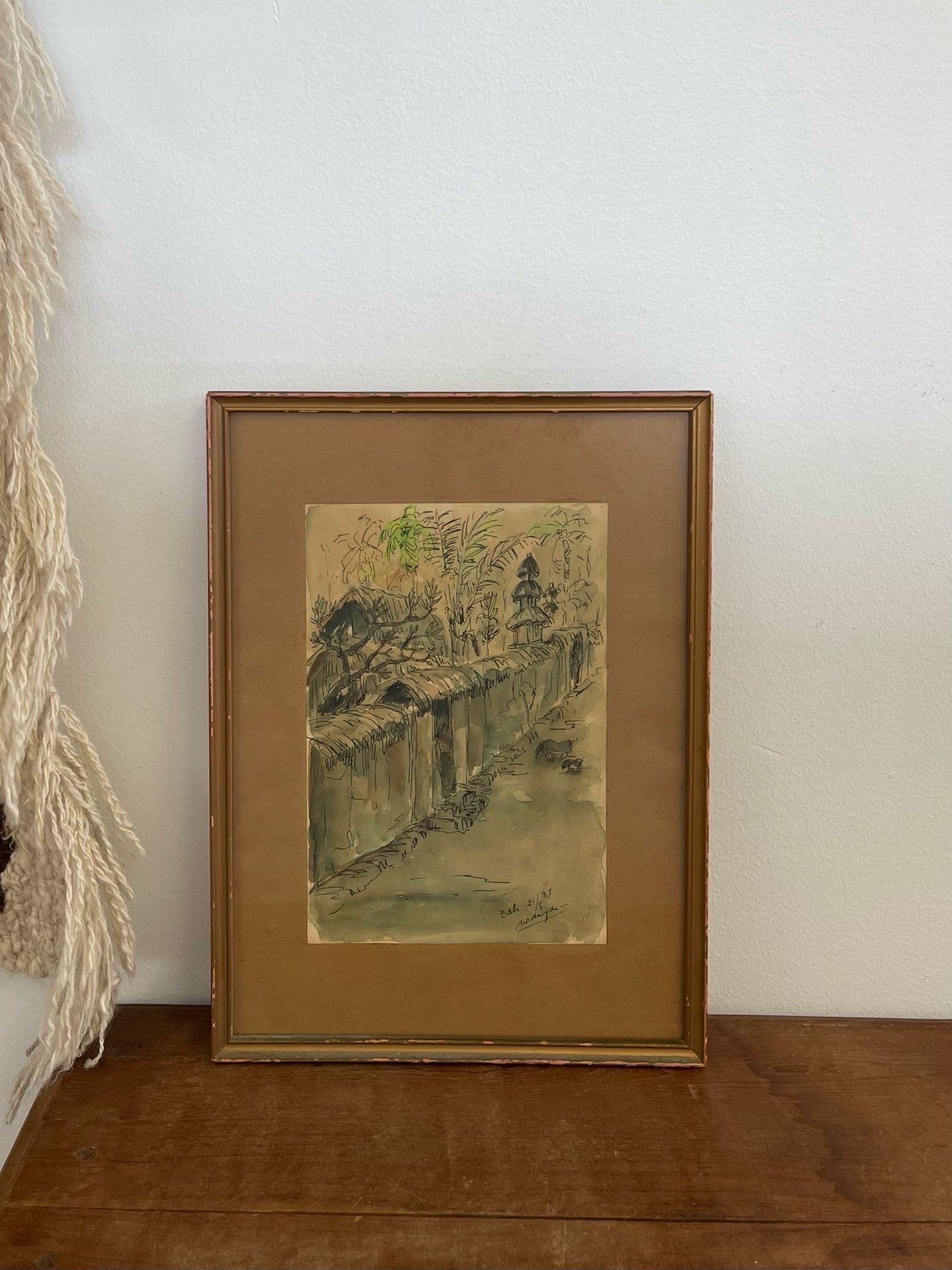 Signature on the lower corner of the painting shows that this Art was inspired by Bali. Possibly Watercolor or Pen on Paper. Professionally framed and matted. Vintage Condition Consistent with Age as Pictured.

Dimensions. 11 1/2 W ; 1/2 D ; 15 1/2 H