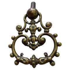Frappeur de porte vintage en bronze orné
