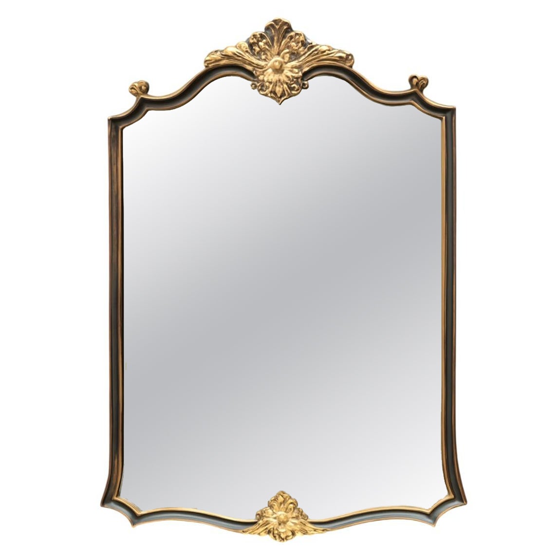 Miroir vintage en bois sculpté et orné