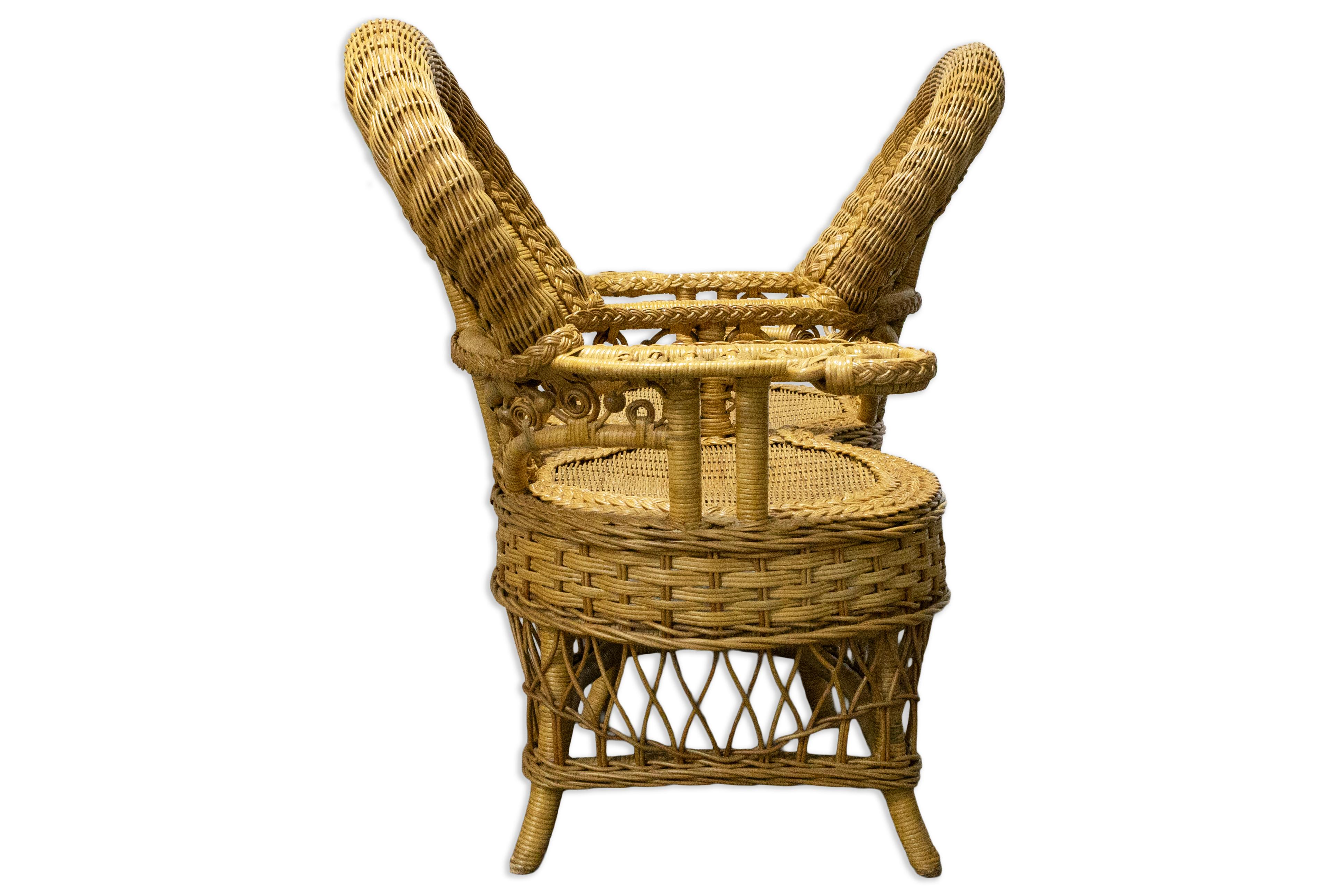 Unknown Vintage Ornate Rattan Tete a Tete Patio Gossip Chair For Sale