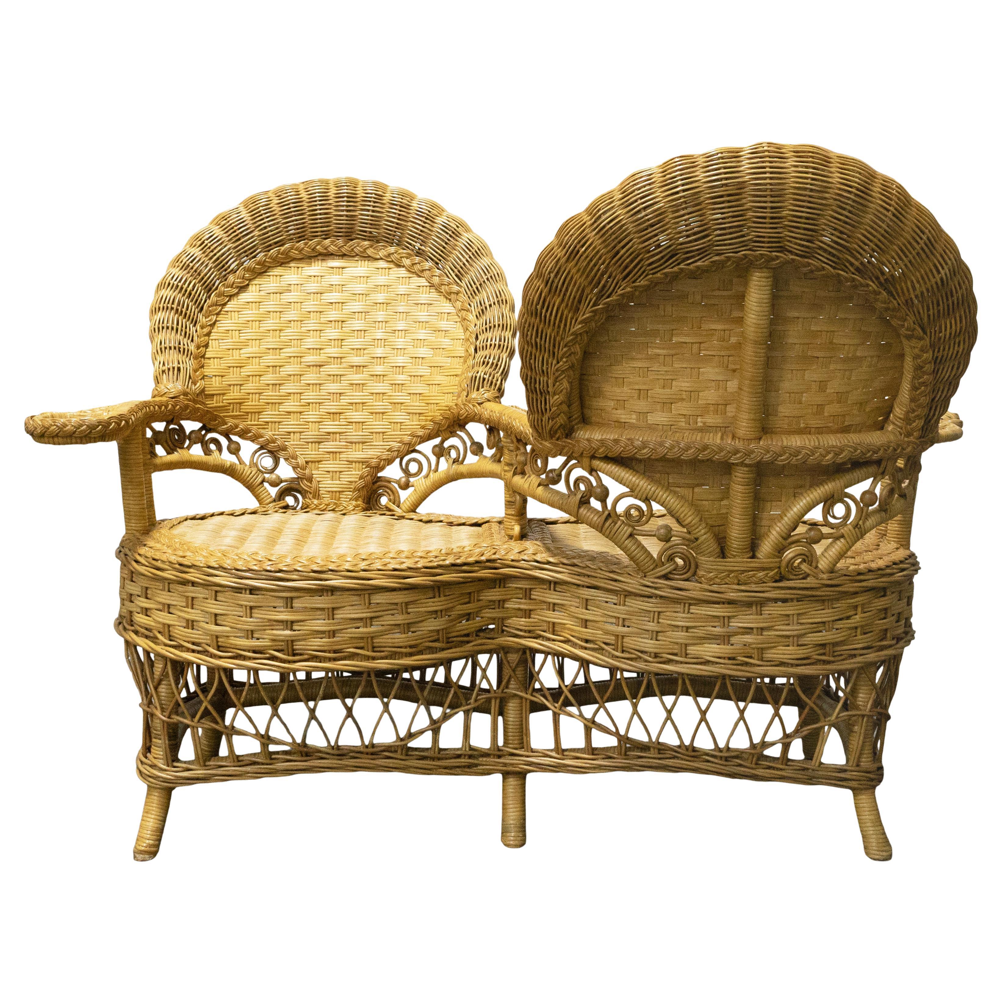 Vintage Ornate Rattan Tete a Tete Patio Gossip Chair For Sale