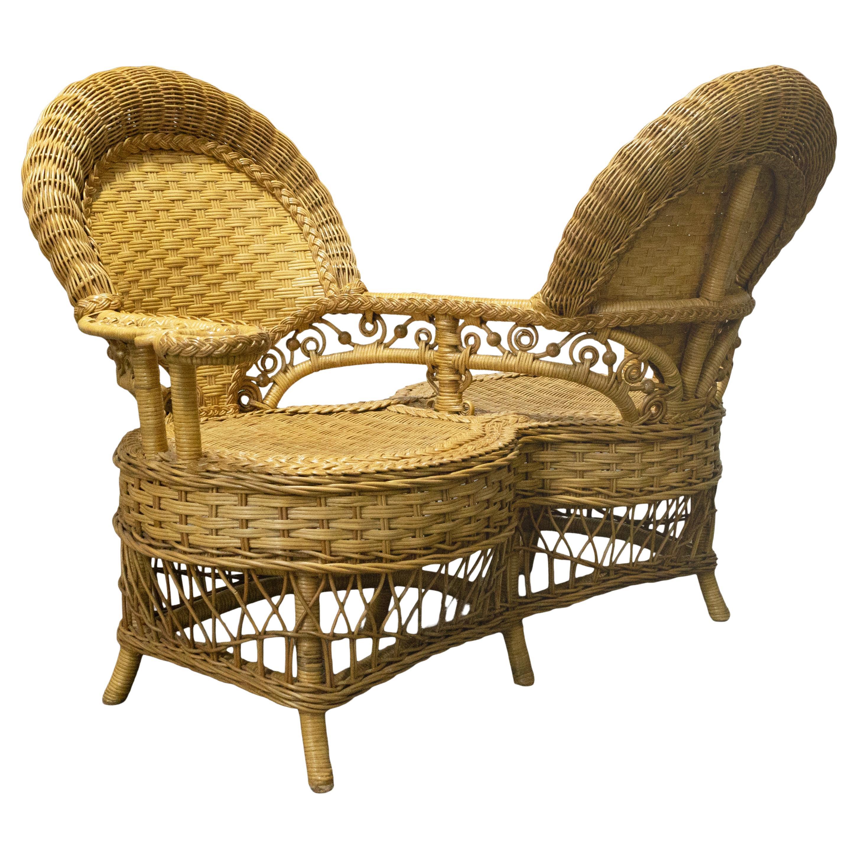 Vintage Ornate Rattan Tete a Tete Patio Gossip Chair For Sale
