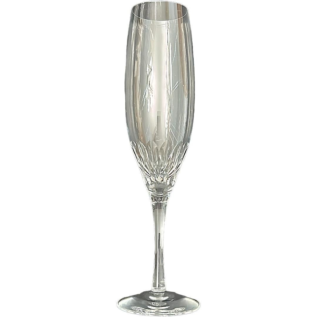 This is a vintage set of twelve champagne flutes from Orrefors, making for a sophisticated addition to your collection.  They are crafted in clear crystal and feature the “Prelude” pattern for a timeless and elegant look.  The flutes are perfect for