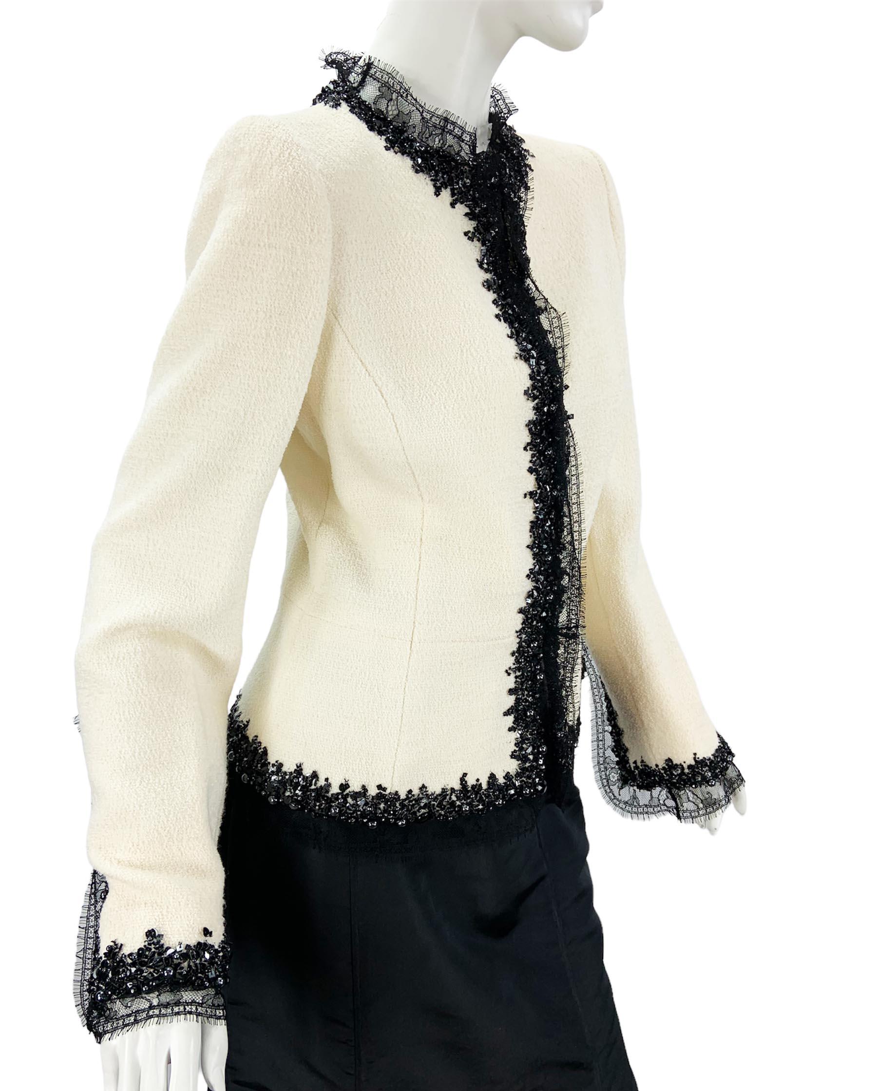Vintage Oscar de la Renta Boucle Embellished Fitted Jacket
US size 8 
Fitted White Boucle Jacket Finished with Black Lace, Beads and Sequins. Fully Lined, Peplum Style, Hook and Eye Closure, Padded Shoulders.
Measurements: Length - 21