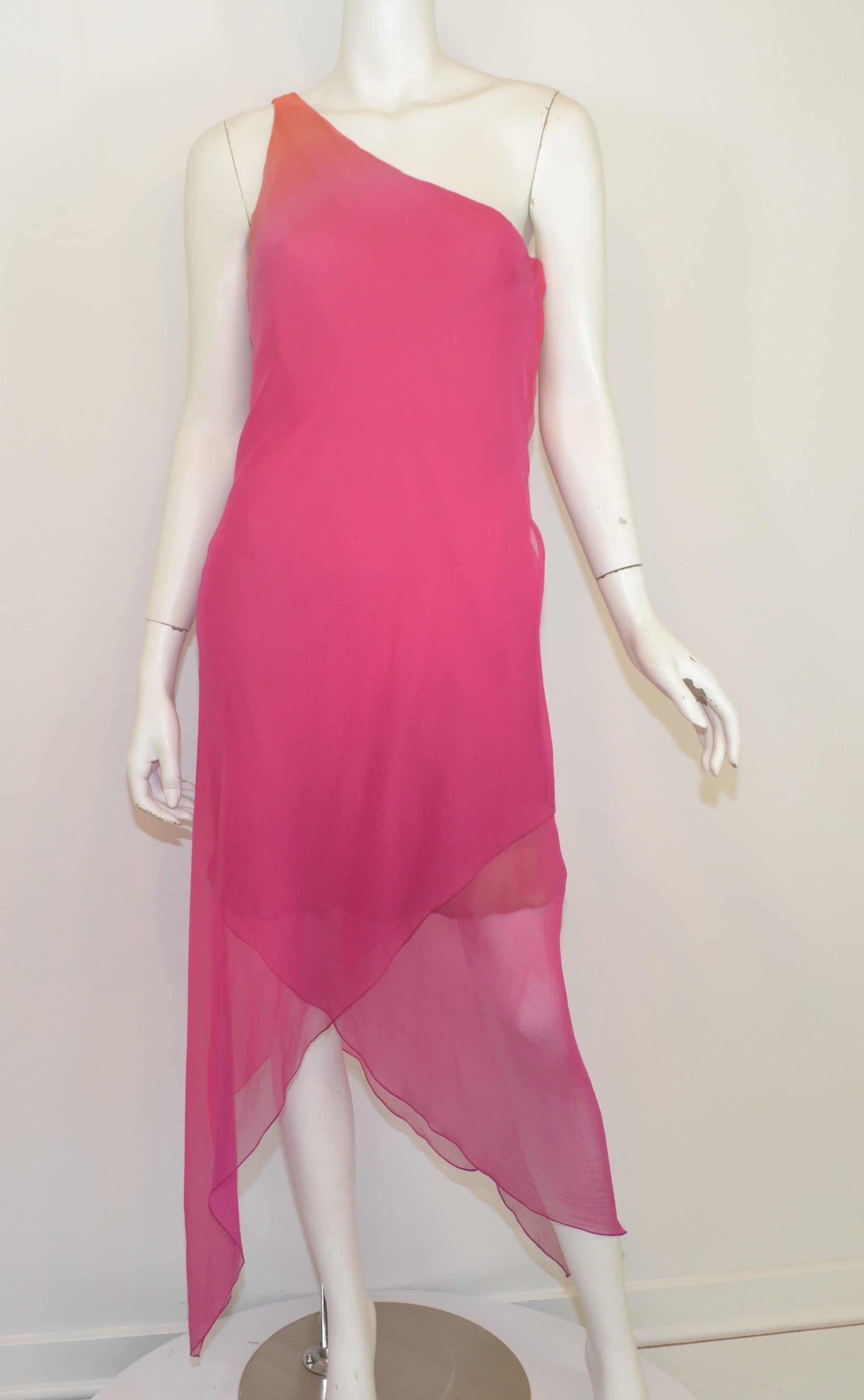 Oscar de la Renta dress features an ombre color scheme with a one-shoulder design. Dress is composed with silk chiffon, has a boned bust/waist, side zipper and snap button fastening, asymmetric hem, and double silk chiffon lining. Dress is in great