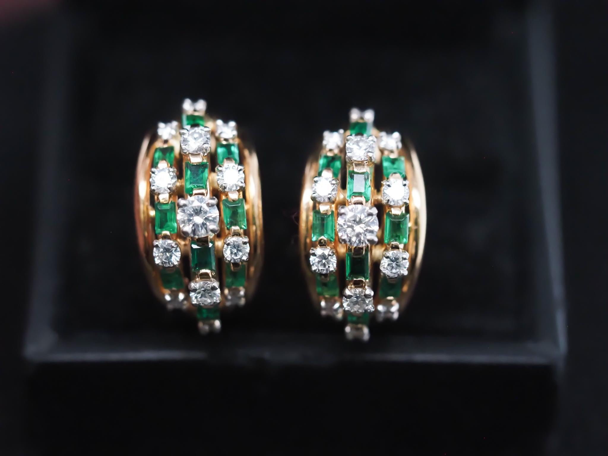 Year: 1980s

Item Details:
Metal Type: 18K Yellow Gold & Platinum [Hallmarked, and Tested]
Weight: 15.7 grams

Diamond Details:
Weight: 2.00ct total weight
Cut: Round Brilliant
Color: E
Clarity: VS

Natural Emerald Details:
Weight: 1.50ct total