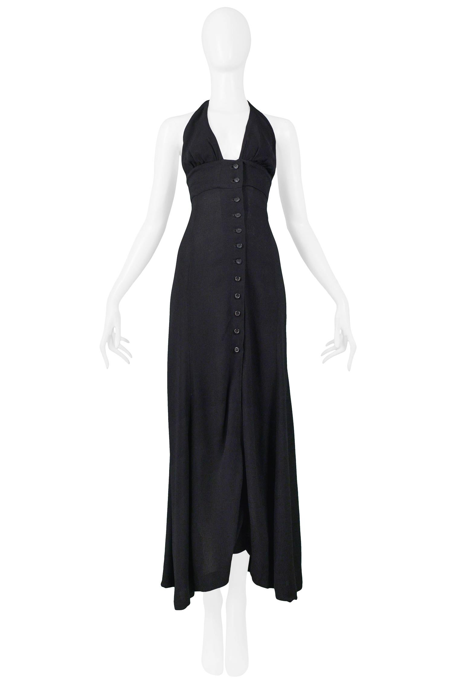 Vintage Ossie Clark black rayon moss crepe maxi dress with halter neckline, empire waist, and buttons down center front.

Excellent Vintage Condition.

Size: UK 12

Measurements:
Bust 30