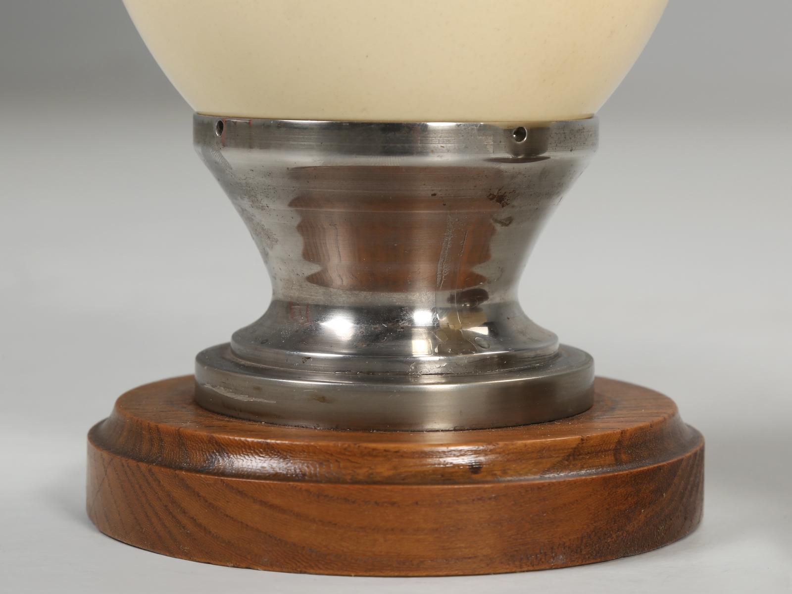 Vintage Ostrich Eggs Mounted on circa 1944 Metal and Wood Stand from France In Good Condition In Chicago, IL
