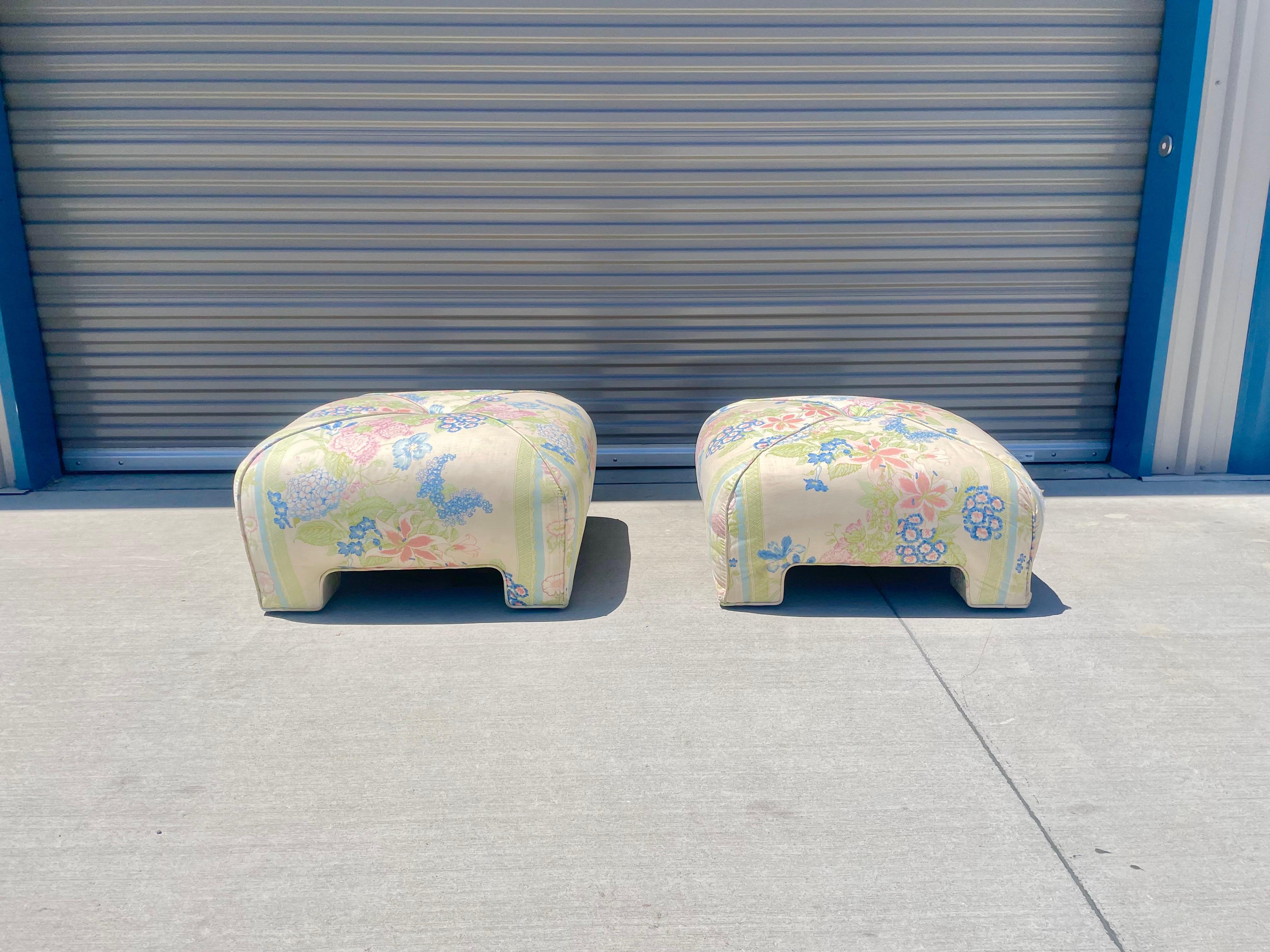 Pair of Vintage ottomans, This Gorgeous pair of ottomans features its original upholstery, perfect addition for your home or office.