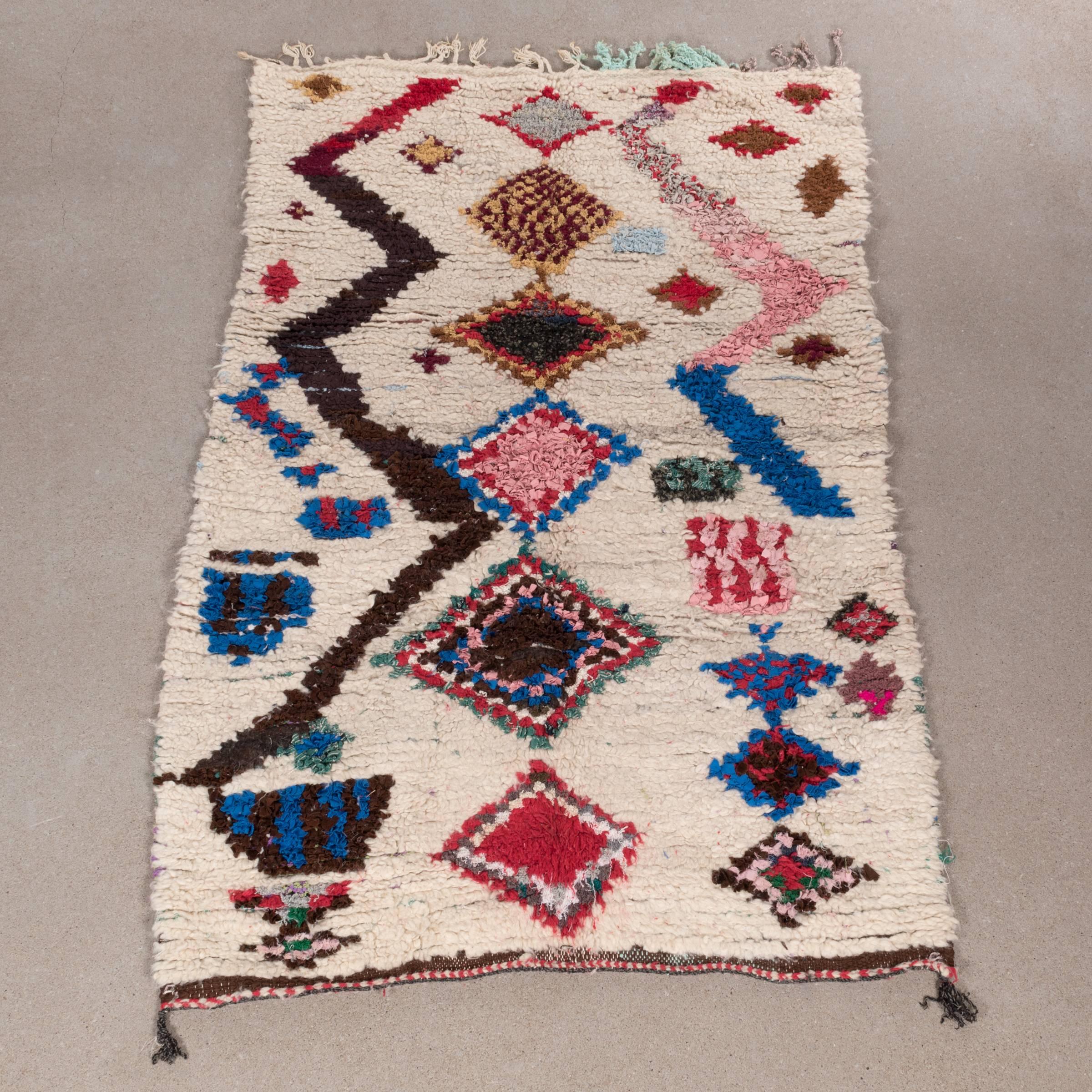 This rug is like a dream of wool! Kind to your feet and bold in color. The slight imperfections make Ourika rugs so charming. They read like a book of history. These colorful, well knotted rugs are entirely handmade and carefully crafted by the