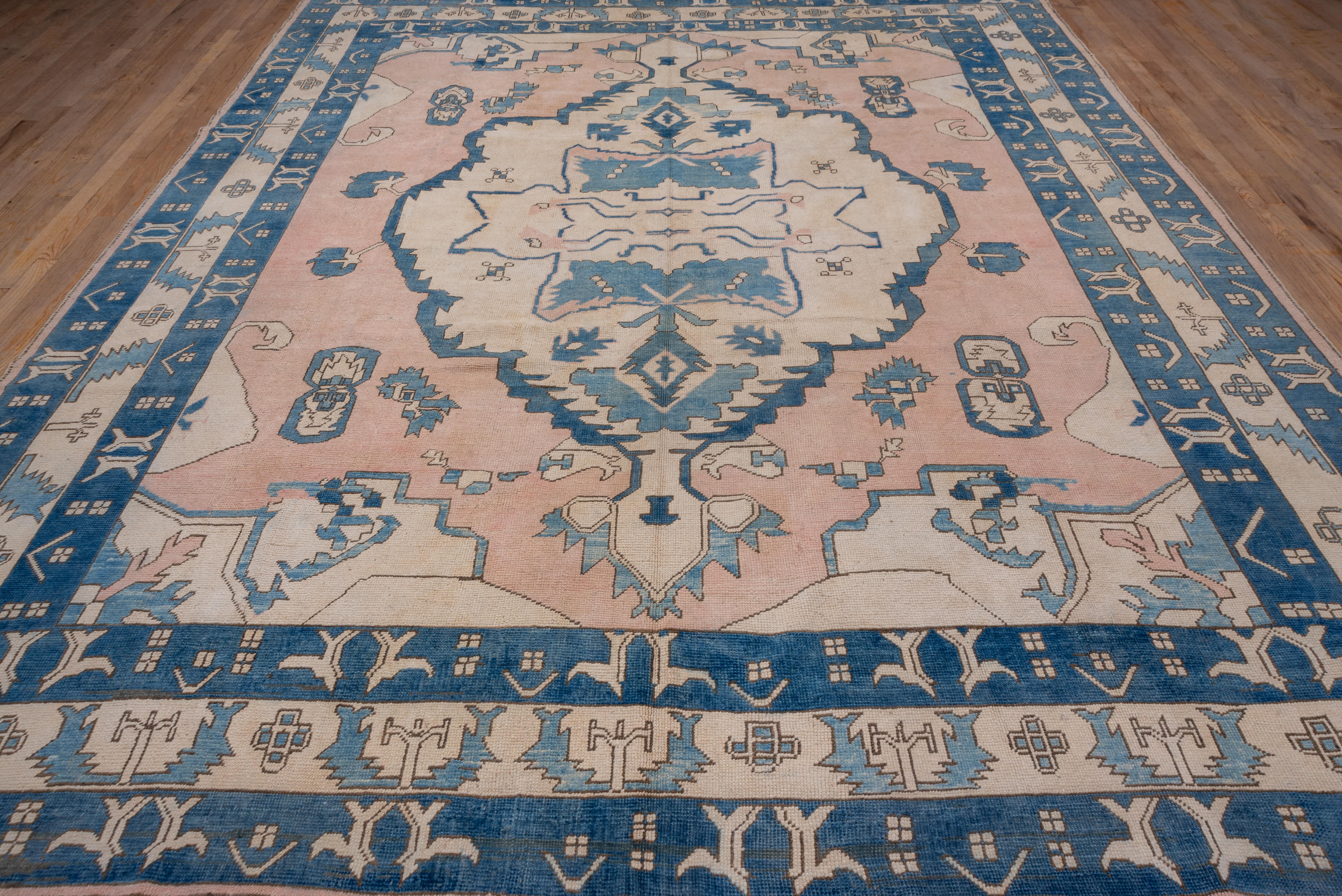 Mid-20th Century Vintage Oushak Carpet, Blue Pink and Cream Accents For Sale