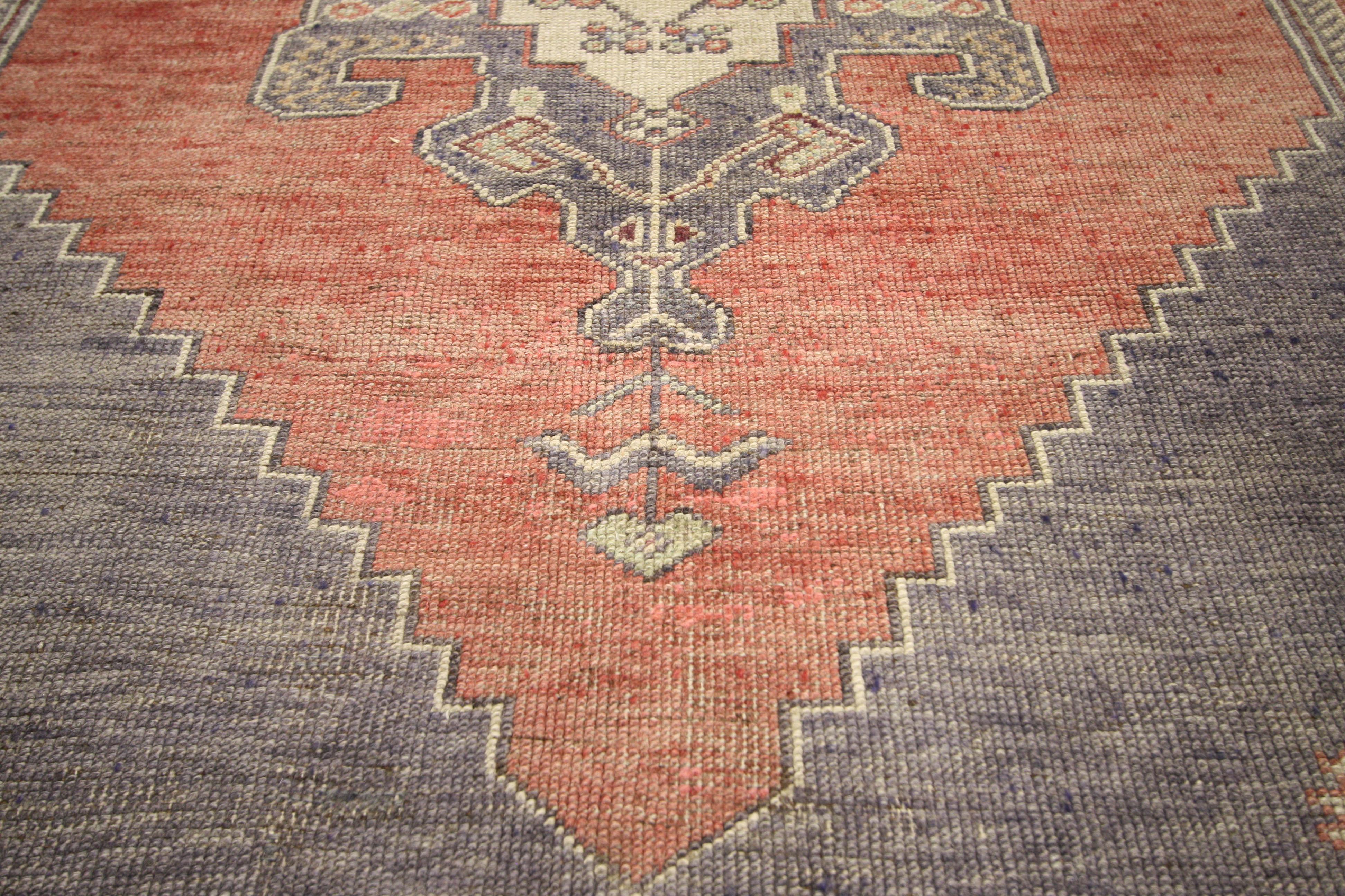 50758 Vintage Turkish Oushak Gallery Rug with Tribal Pattern, Wide Hallway Runner 04'10 x 09'04. . This exquisite Oushak rug features a rectilinear medallion in slate gray, wine and light taupe on a contrasting field of red. The medallion is