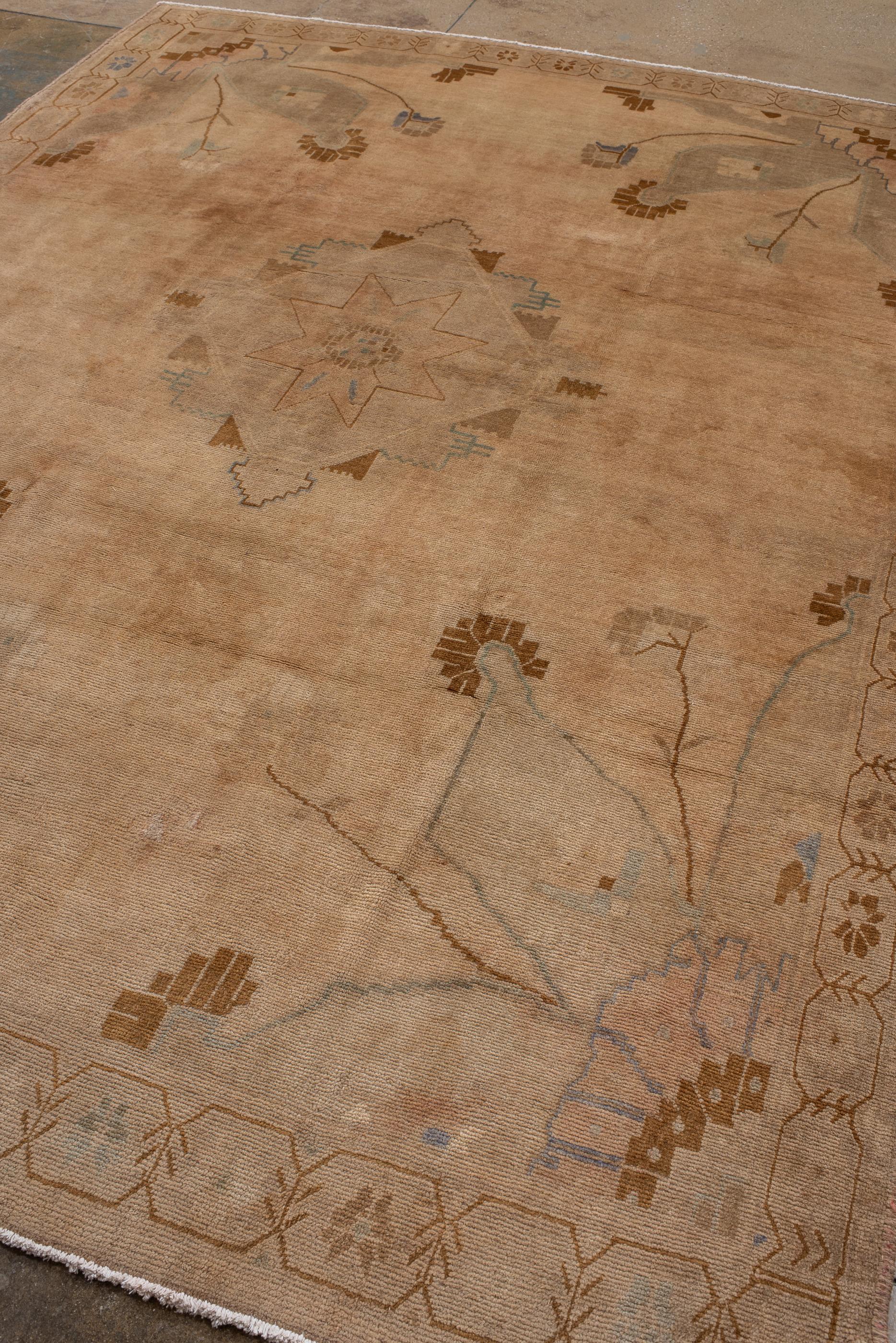 Turkish Vintage Oushak in Abrashed Beige with Spacious Field and Flower Design For Sale