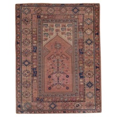 Antique Oushak in Faded Red and Washed Orange with Geometric Influence Allover