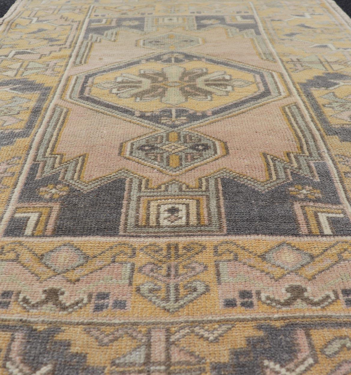 Turkish Vintage Oushak Rug from Turkey with Medallion Design in Yellow, Pink, Grey Blue For Sale