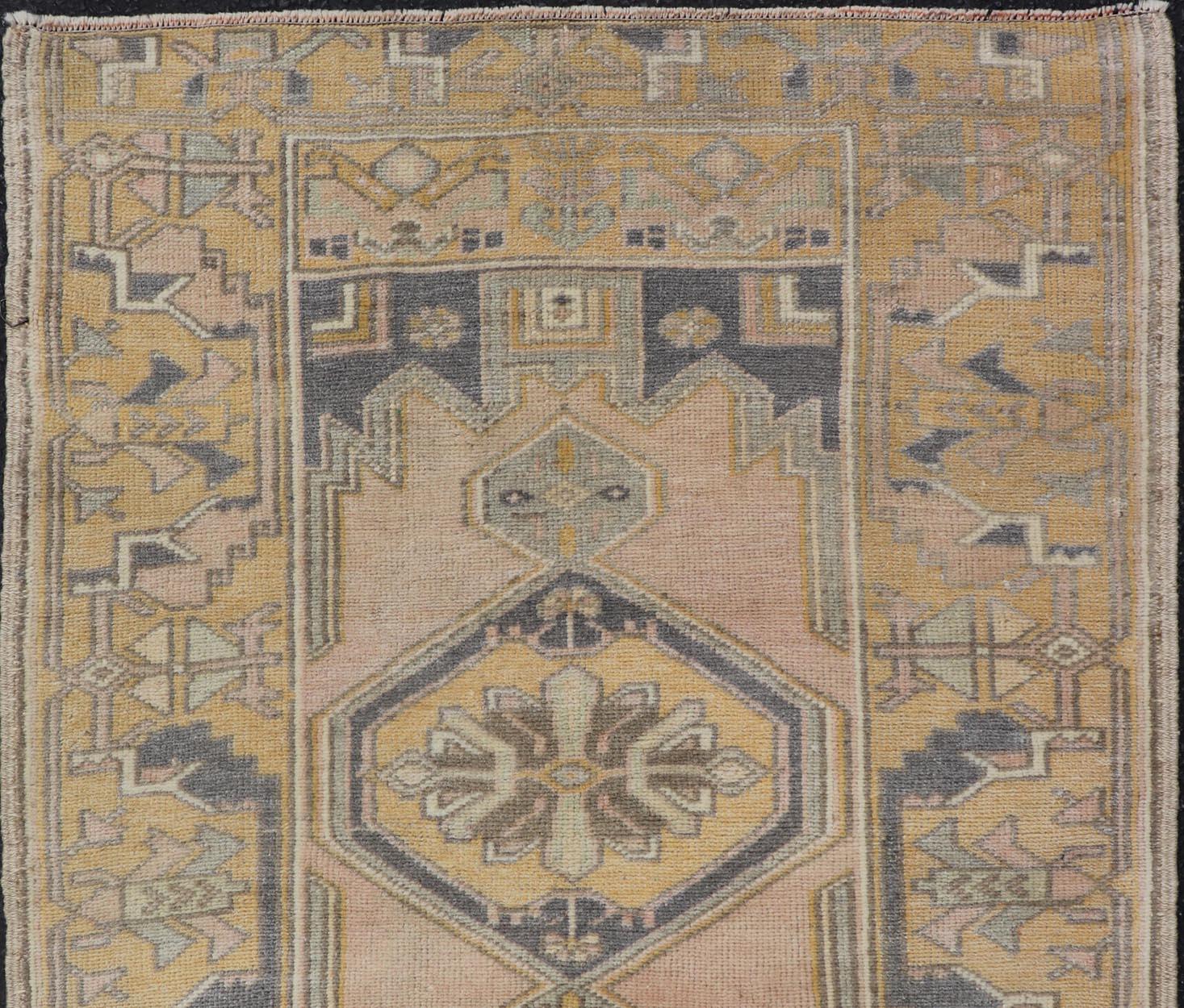 20th Century Vintage Oushak Rug from Turkey with Medallion Design in Yellow, Pink, Grey Blue For Sale