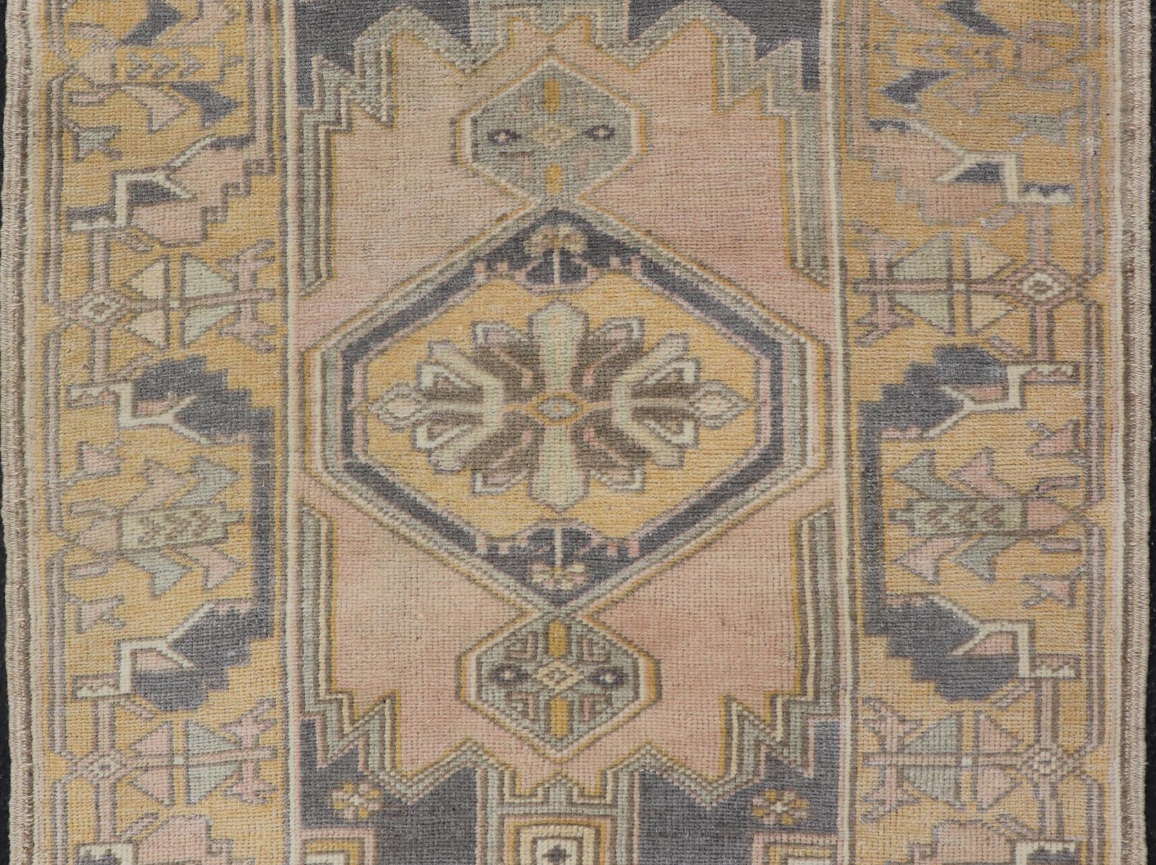 Wool Vintage Oushak Rug from Turkey with Medallion Design in Yellow, Pink, Grey Blue For Sale