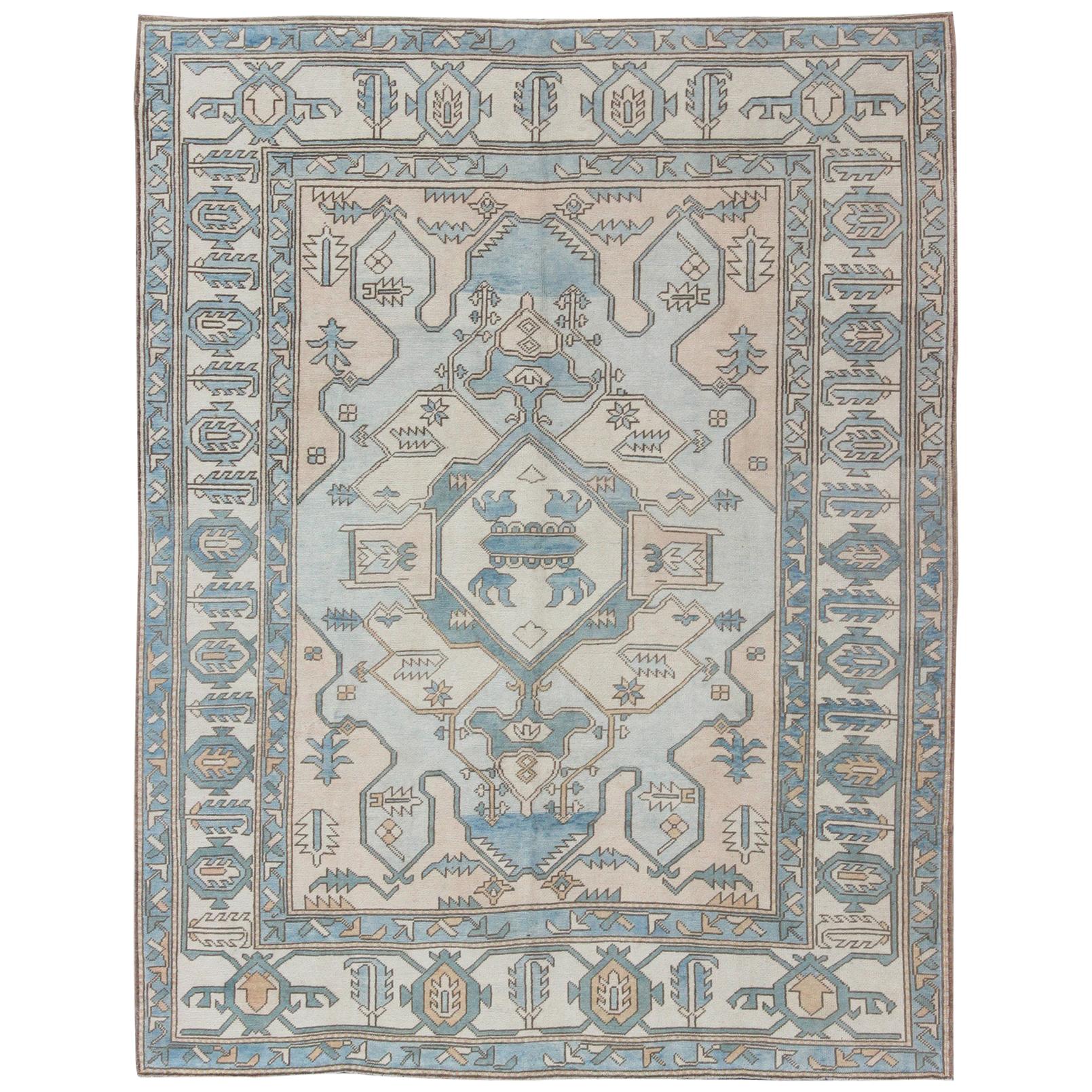Vintage Oushak Rug from Turkey with Medallion in Shades of Blue, Cream and Nude