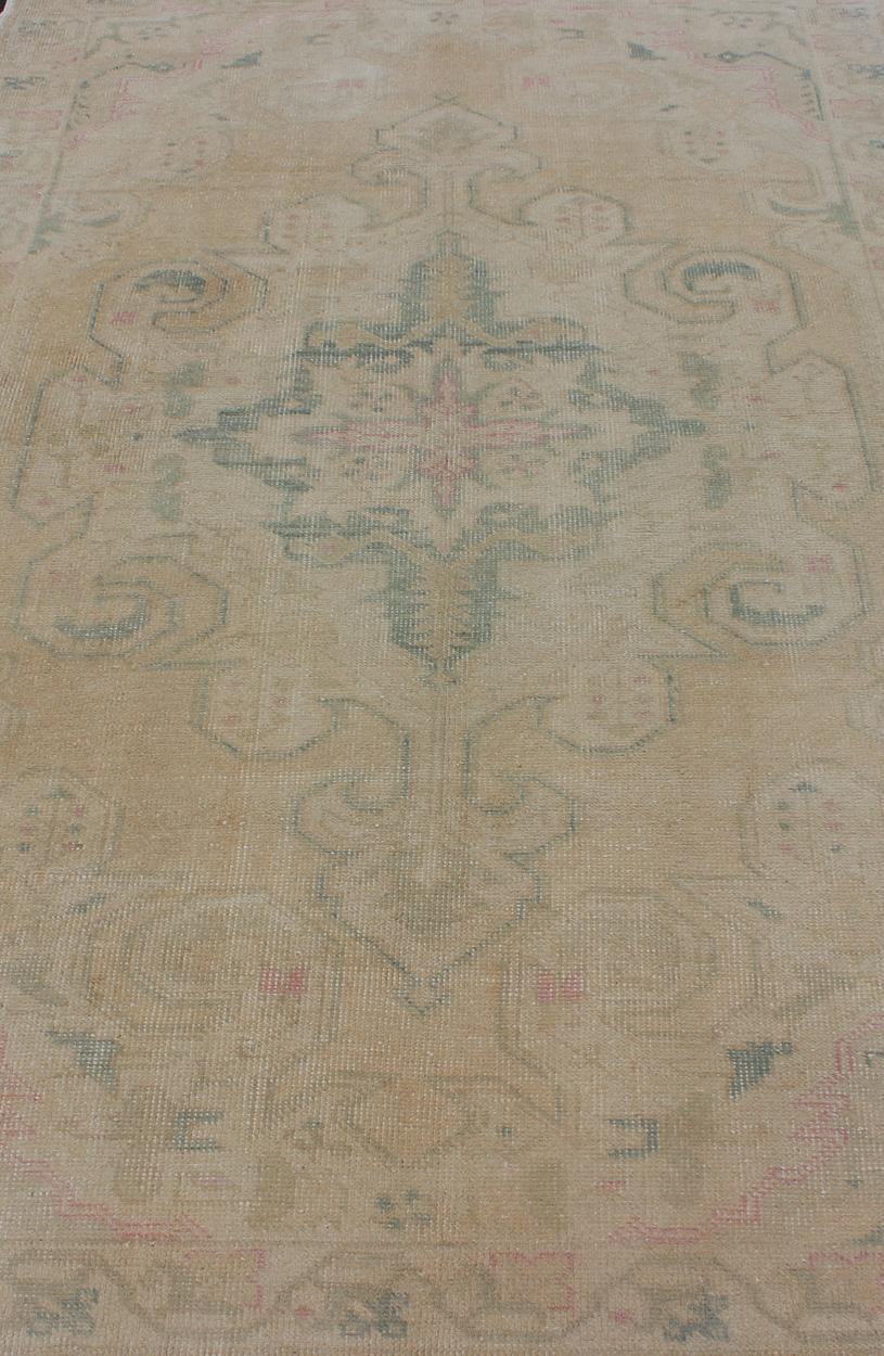 Vintage Oushak Rug from Turkey with Muted Colors and Floral Medallion In Good Condition For Sale In Atlanta, GA