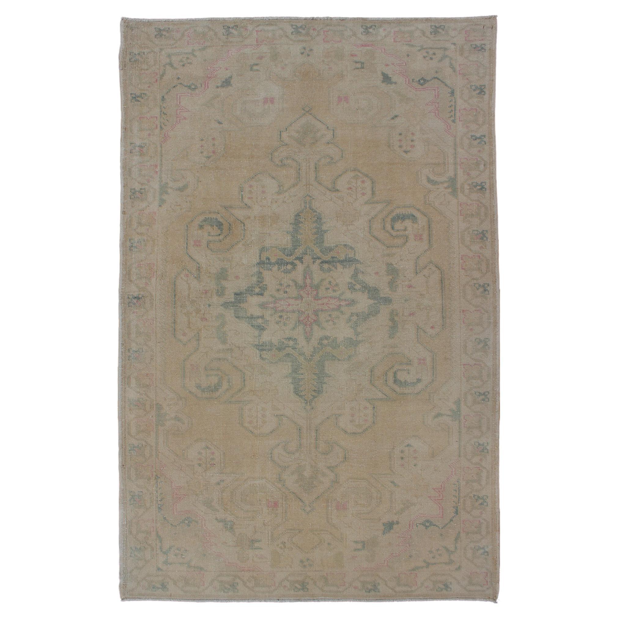 Vintage Oushak Rug from Turkey with Muted Colors and Floral Medallion For Sale