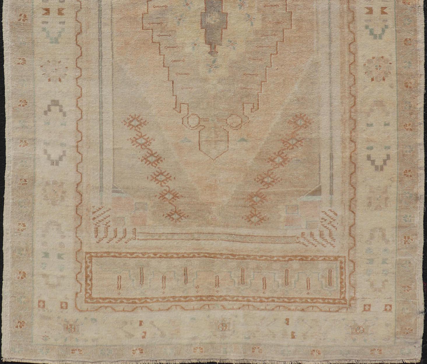 Wool Vintage Oushak Rug from Turkey with Muted Colors and Tribal Medallion For Sale