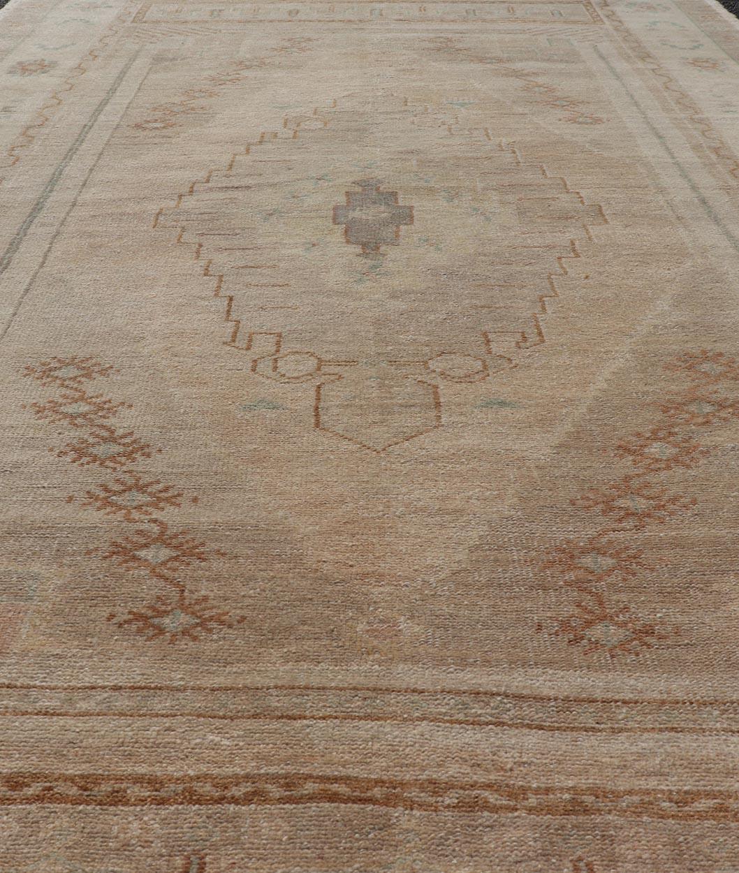 Vintage Oushak Rug from Turkey with Muted Colors and Tribal Medallion For Sale 1