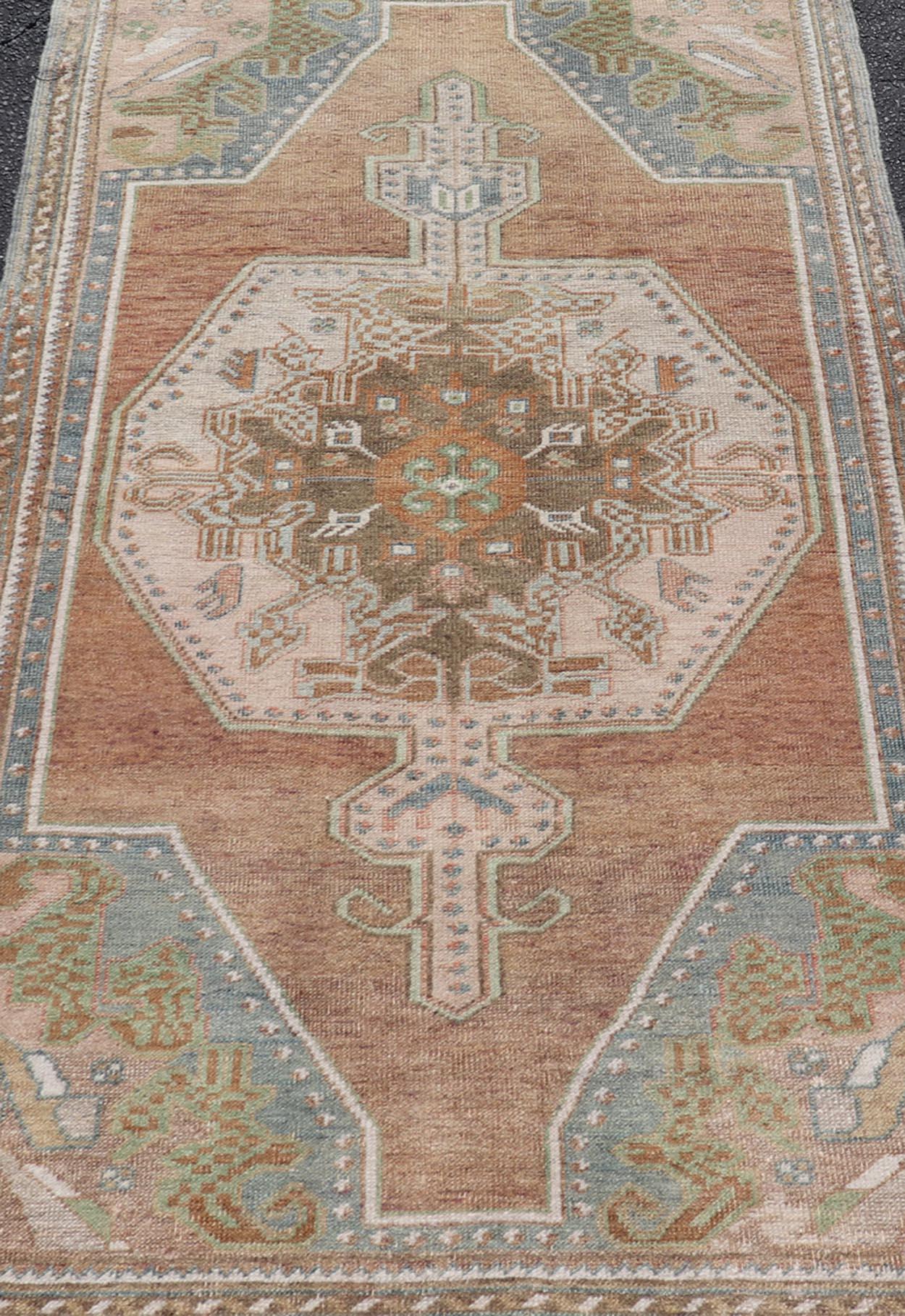 Wool Vintage Oushak Rug in Light Brown Background and Cream, and Light Blue For Sale