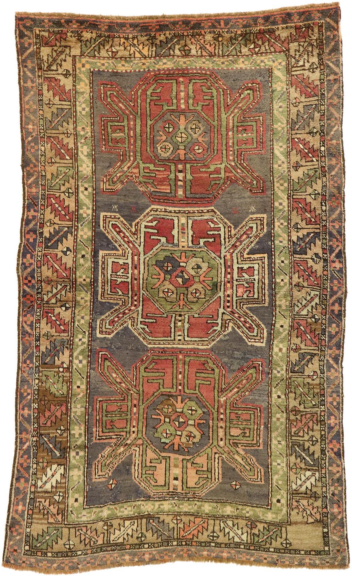 Vintage Turkish Oushak Rug with Tribal Style and Amulet Pattern For Sale