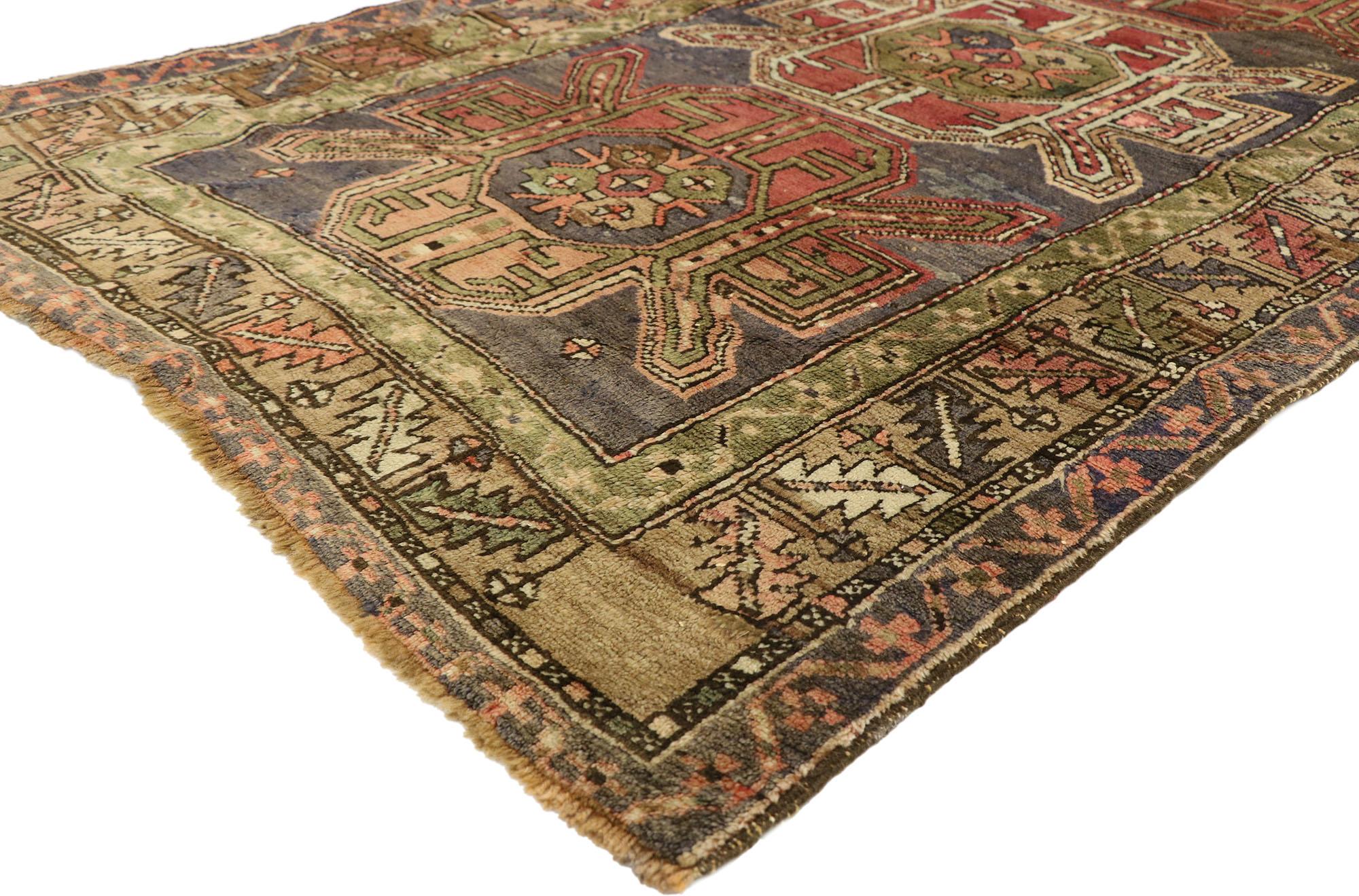 51392, Vintage Turkish Oushak Rug with Tribal Style and Amulet Pattern. This striking Turkish Oushak rug features a triple amulet pattern in time-softened colors. The vintage Oushak rug is bordered with a replicated leaf in red, slate and green on a