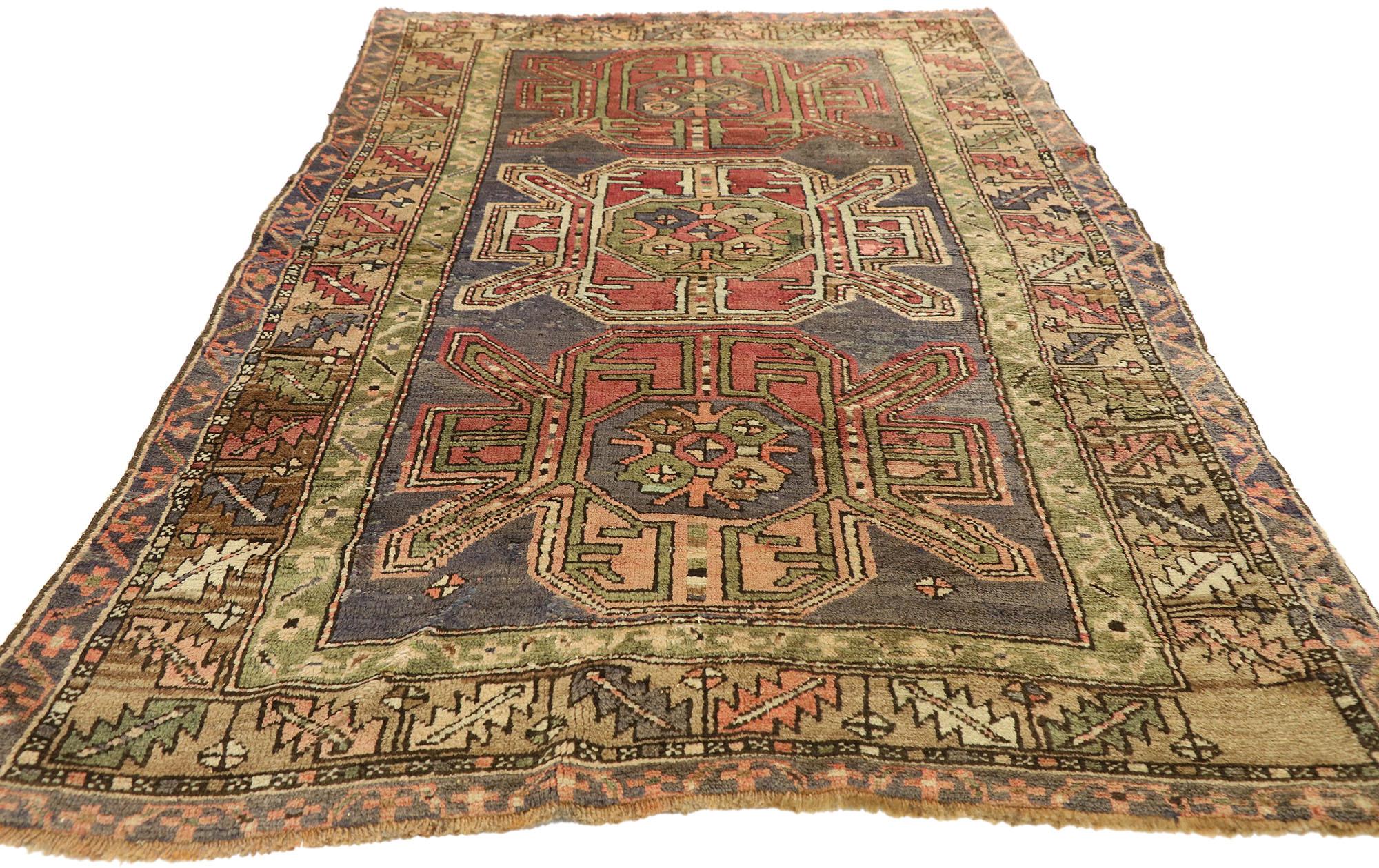 Hand-Knotted Vintage Turkish Oushak Rug with Tribal Style and Amulet Pattern For Sale