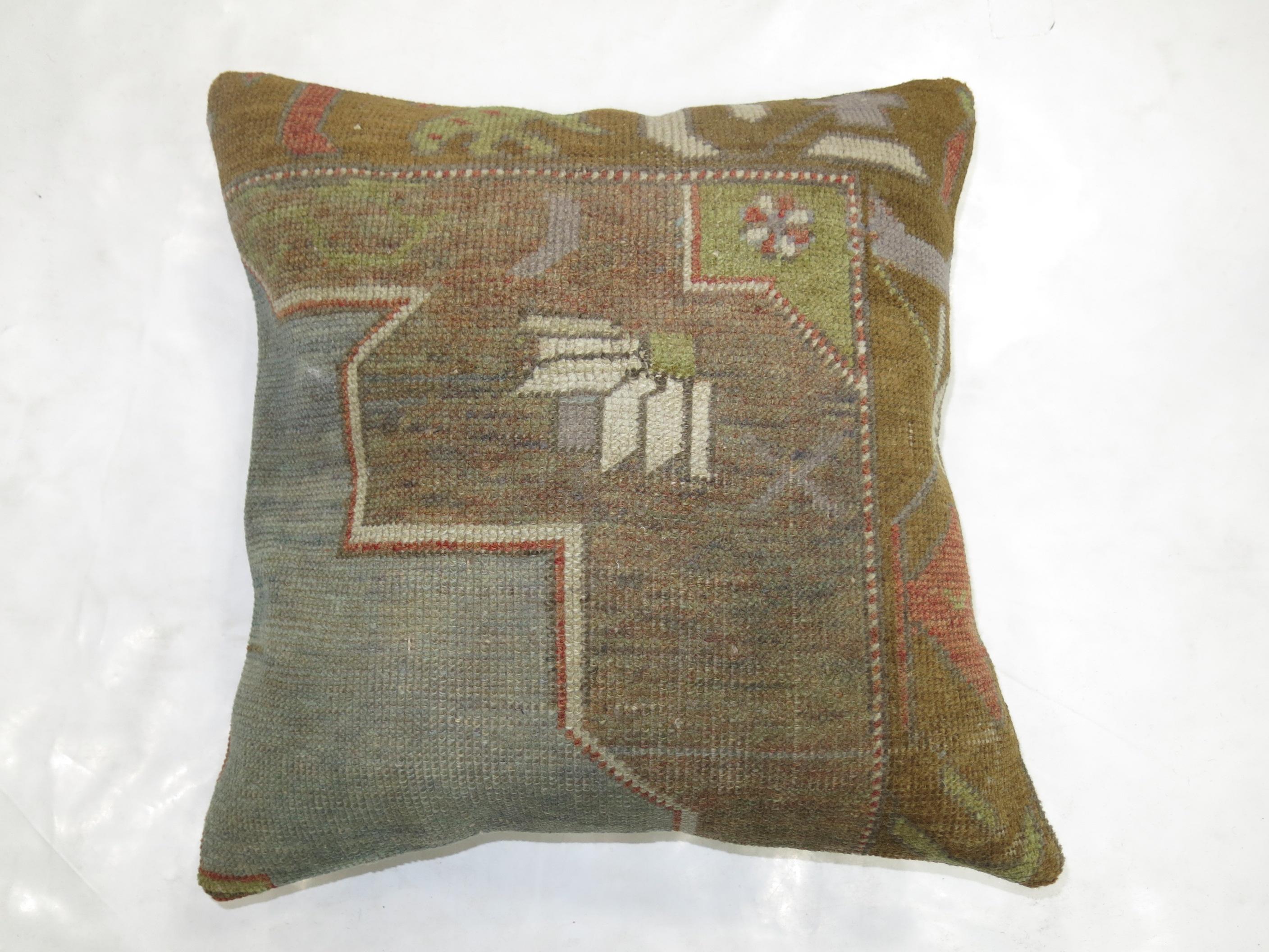 Pillow made from a vintage Turkish Oushak rug.