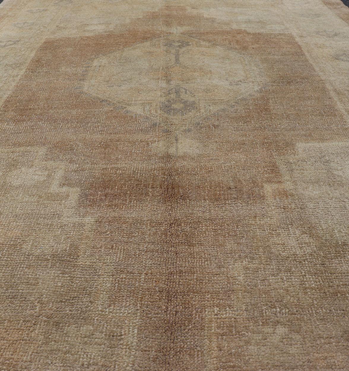 Vintage Oushak Rug Rug with Mocha Color and Pale Neutral Tones In Good Condition For Sale In Atlanta, GA