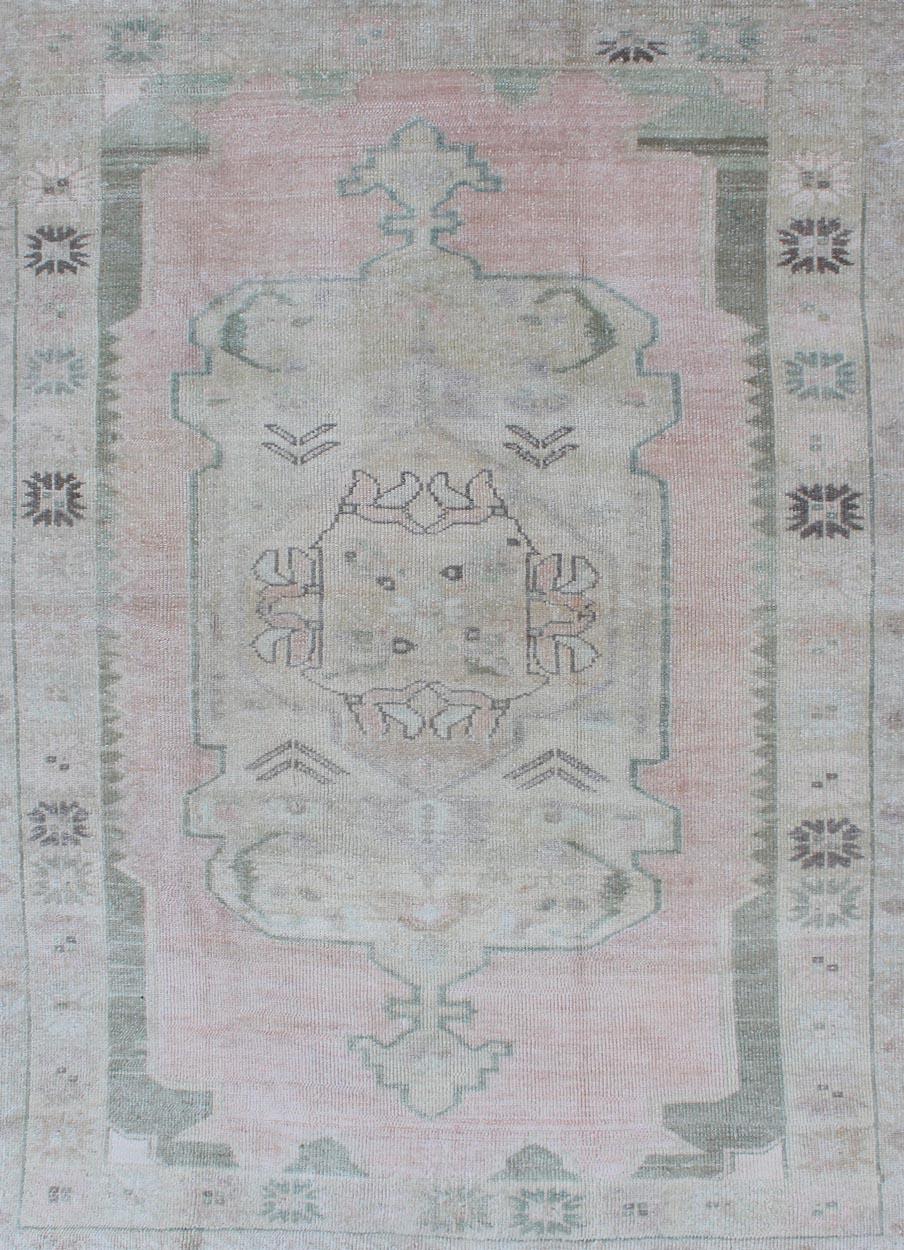 Hand-Knotted Vintage Oushak Rug with Central Medallion Warm Blush, Pink and Light Green