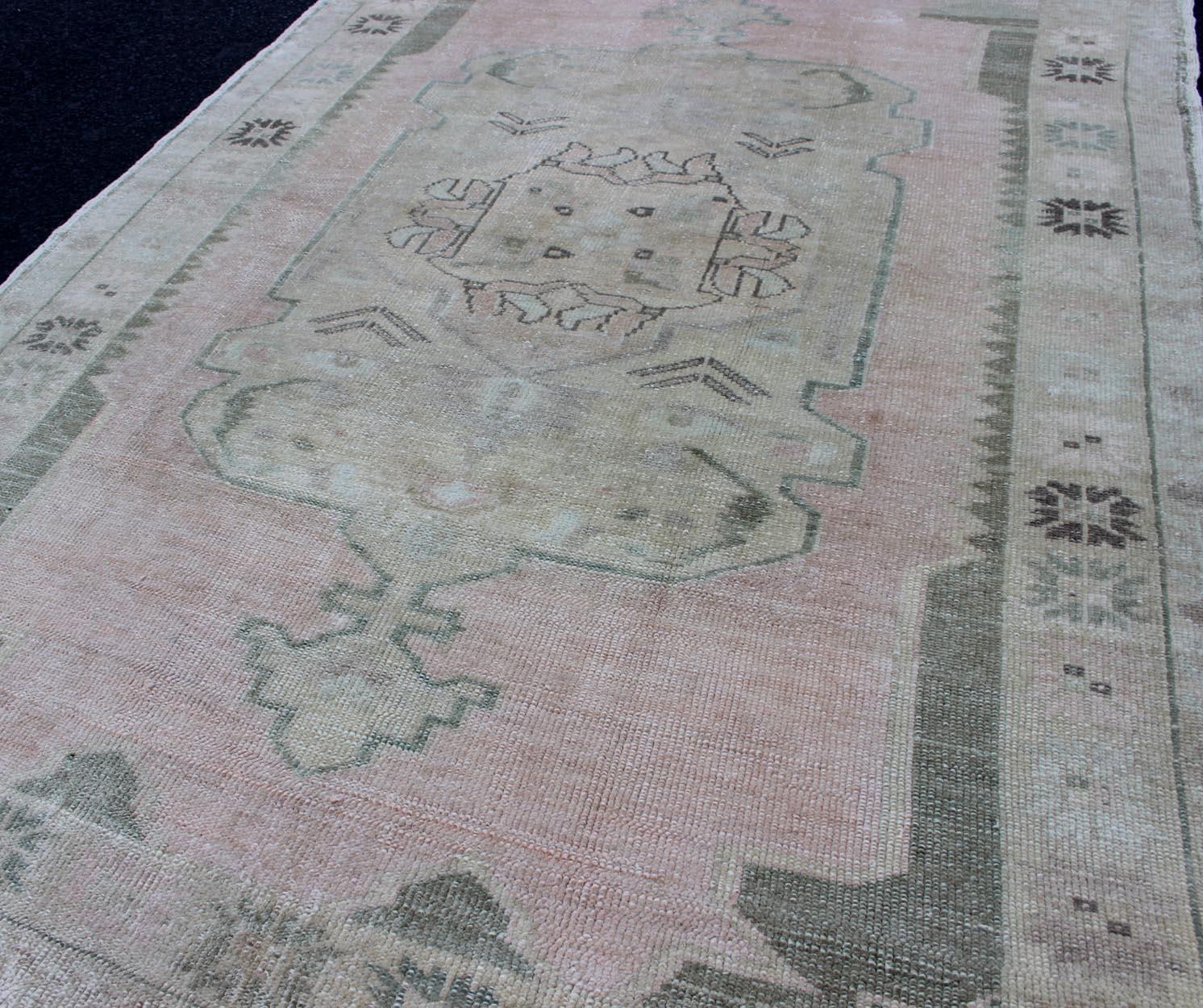 Vintage Oushak Rug with Central Medallion Warm Blush, Pink and Light Green In Good Condition In Atlanta, GA