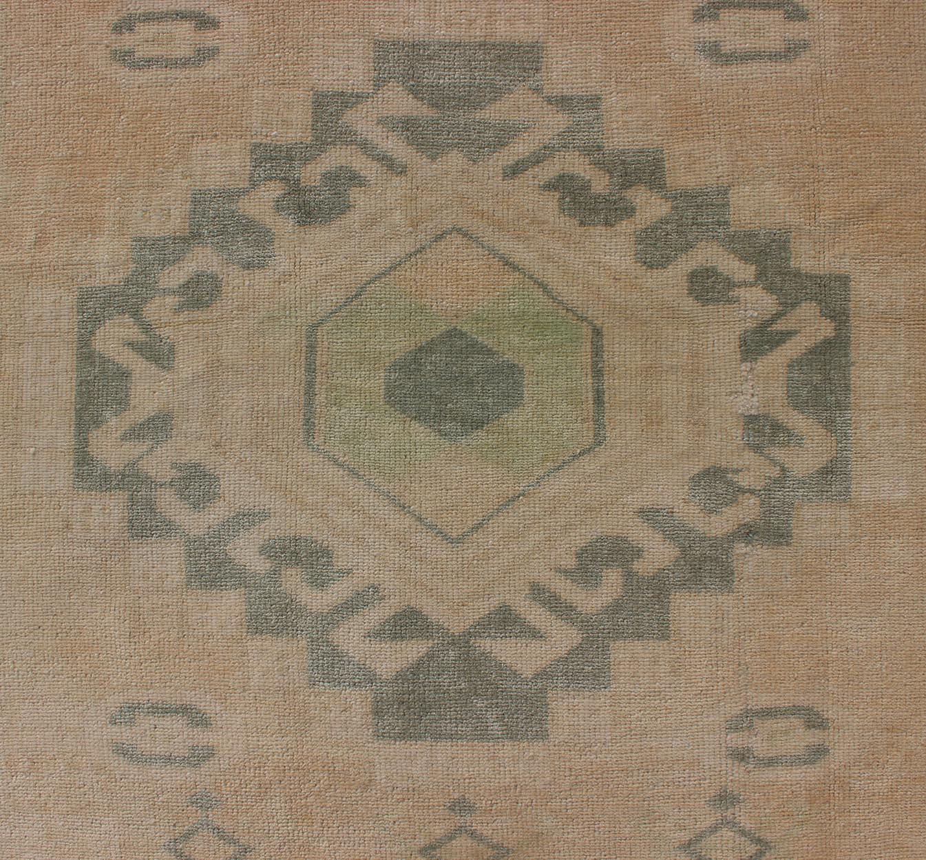 Vintage Oushak Rug with Central Medallion Warm Tones And Green Tones For Sale 1