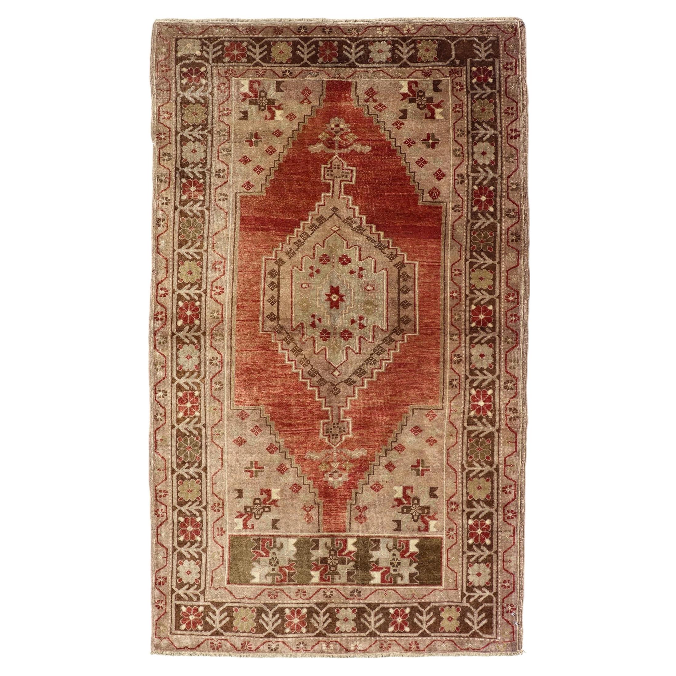 Vintage Oushak Rug With Geometric Motifs in Terracotta, Green and Tan For Sale