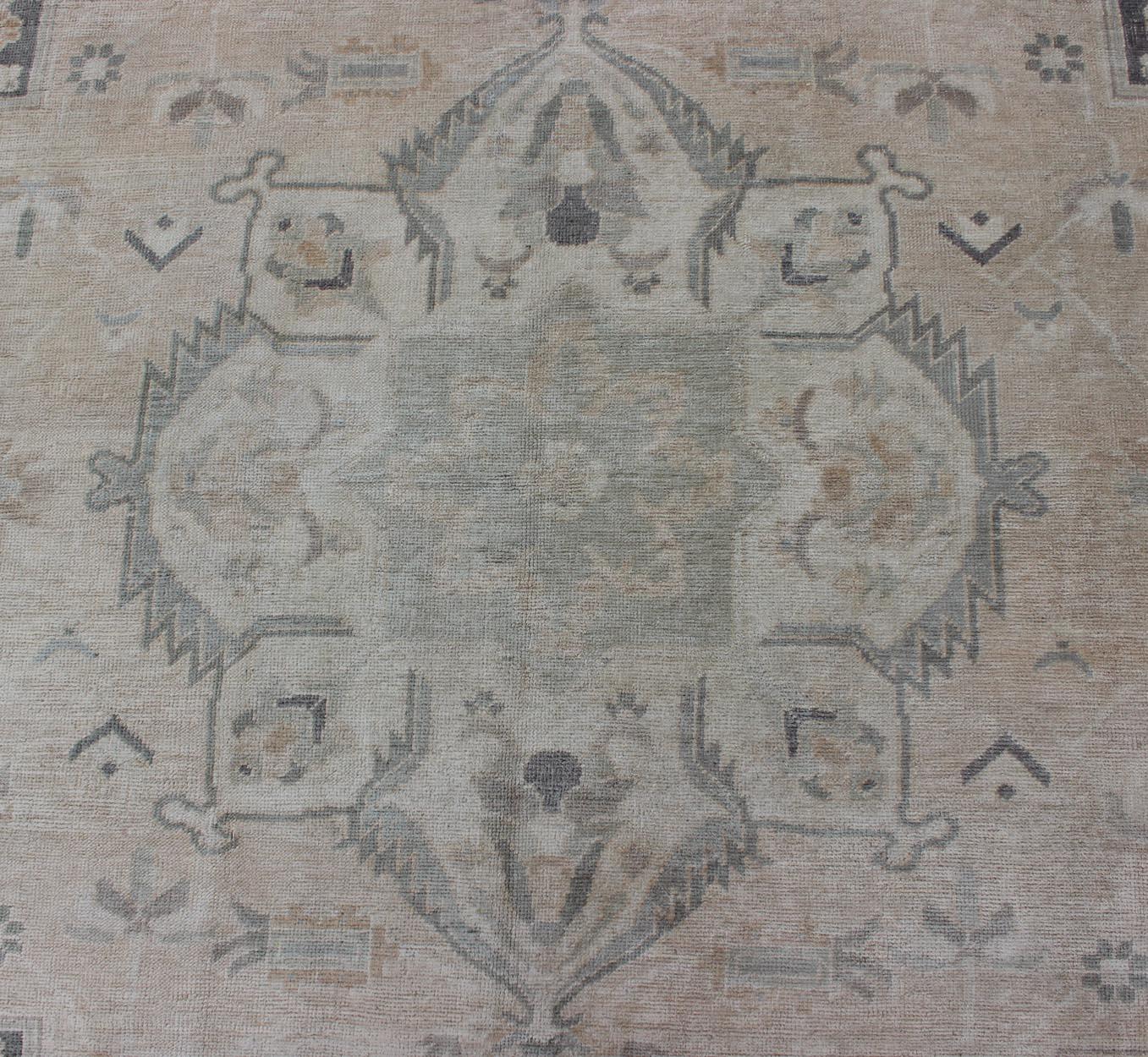 Mid-20th Century Vintage Oushak Rug with Layered Classic Medallion Design and Ornate Cornices For Sale