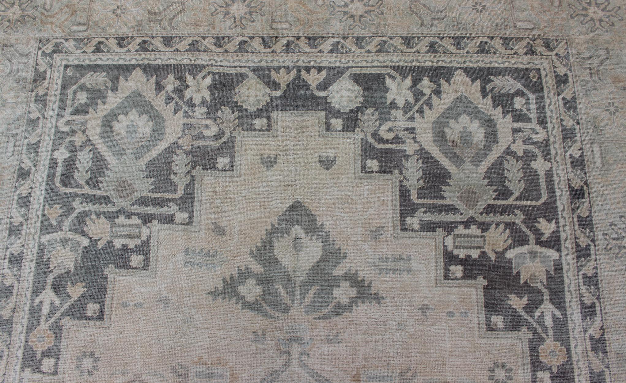 Wool Vintage Oushak Rug with Layered Classic Medallion Design and Ornate Cornices For Sale