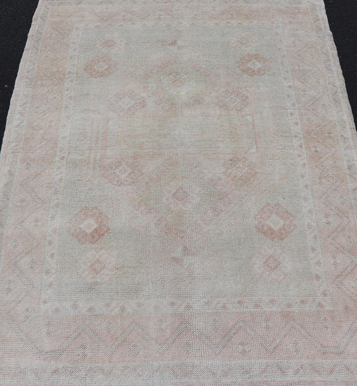 Hand-Knotted Vintage Oushak Rug with Pastel Colors in Tan, Green, Butter Yellow, and Pink For Sale
