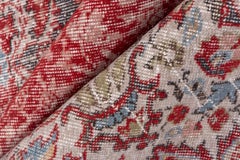Tapis vintage d'Oushak avec médaillon rouge et motifs floraux